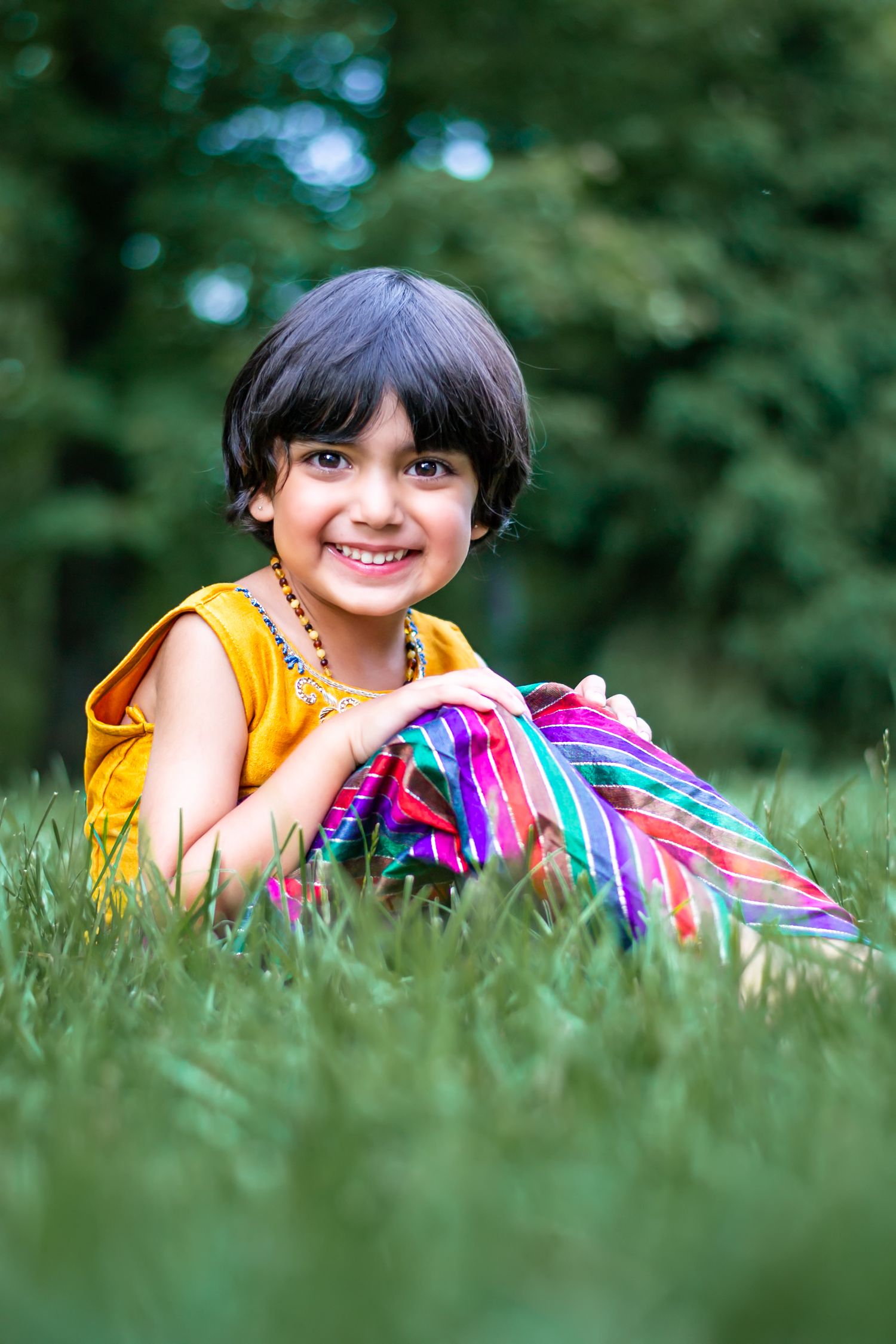 Outdoor portrait of a young child captured in natural light by ek-framedmemories