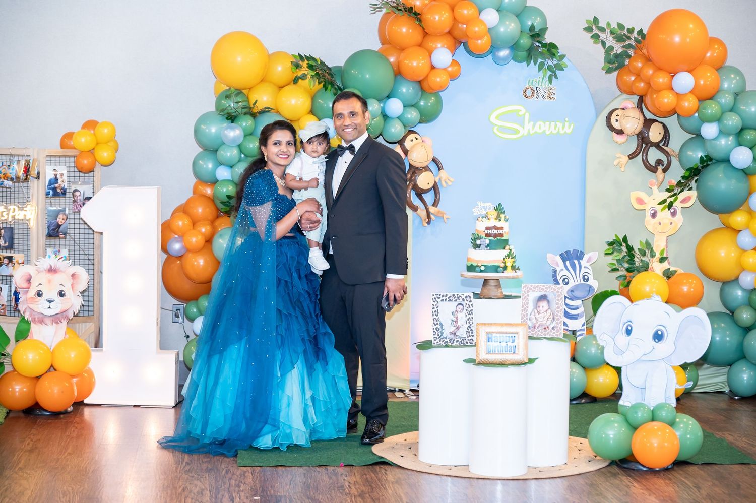 First birthday party celebration with child and family, photographed indoors  using flash lighting by ek-framedmemor