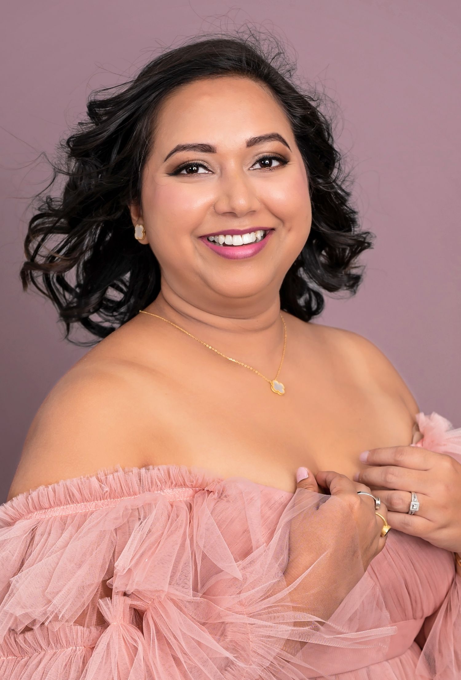 Half-body studio branding portrait of a woman in an elegant gown, captured by ek-framedmemories