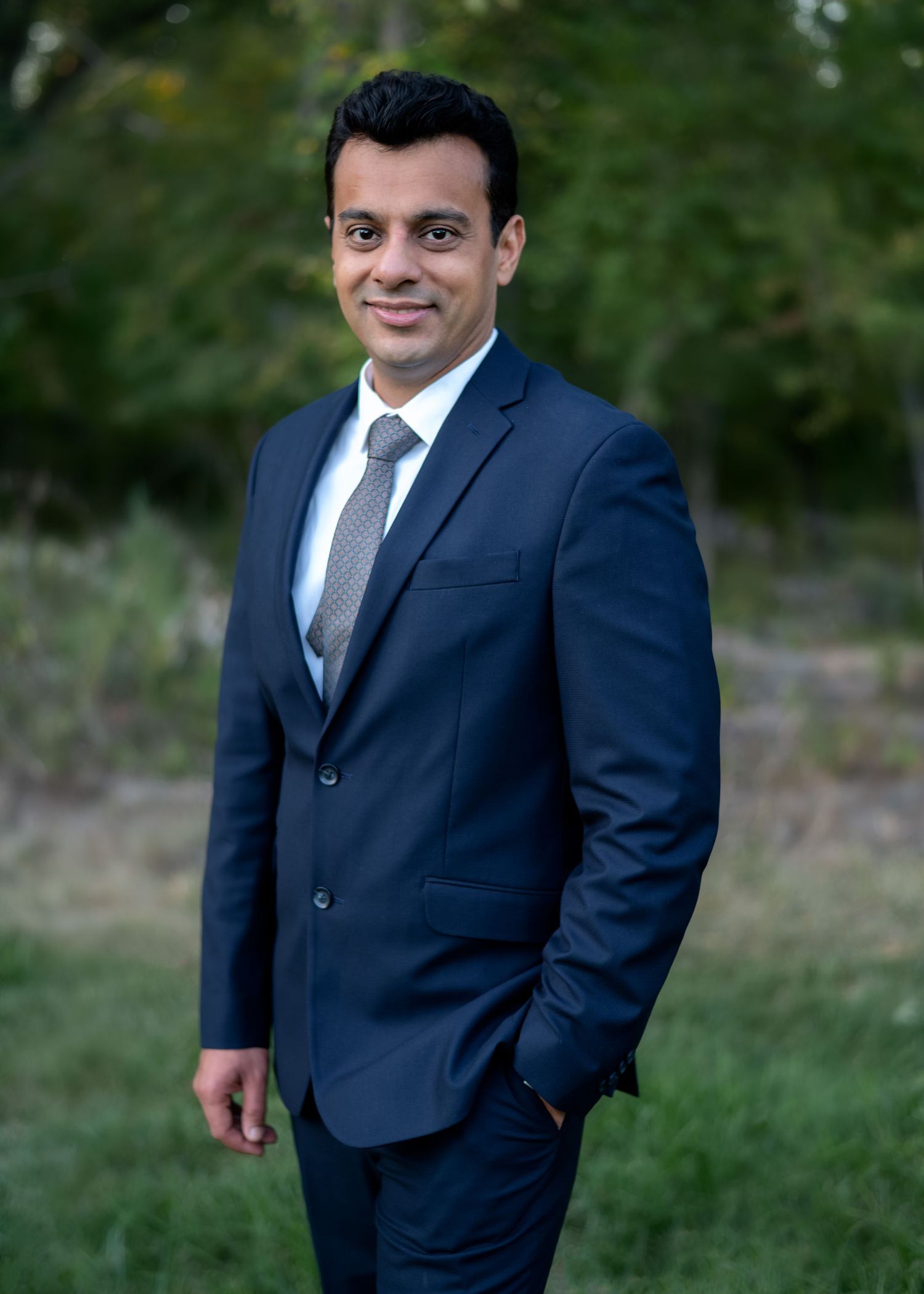 Outdoor portrait of a man showcasing personality and confidence by ek-framedmemories