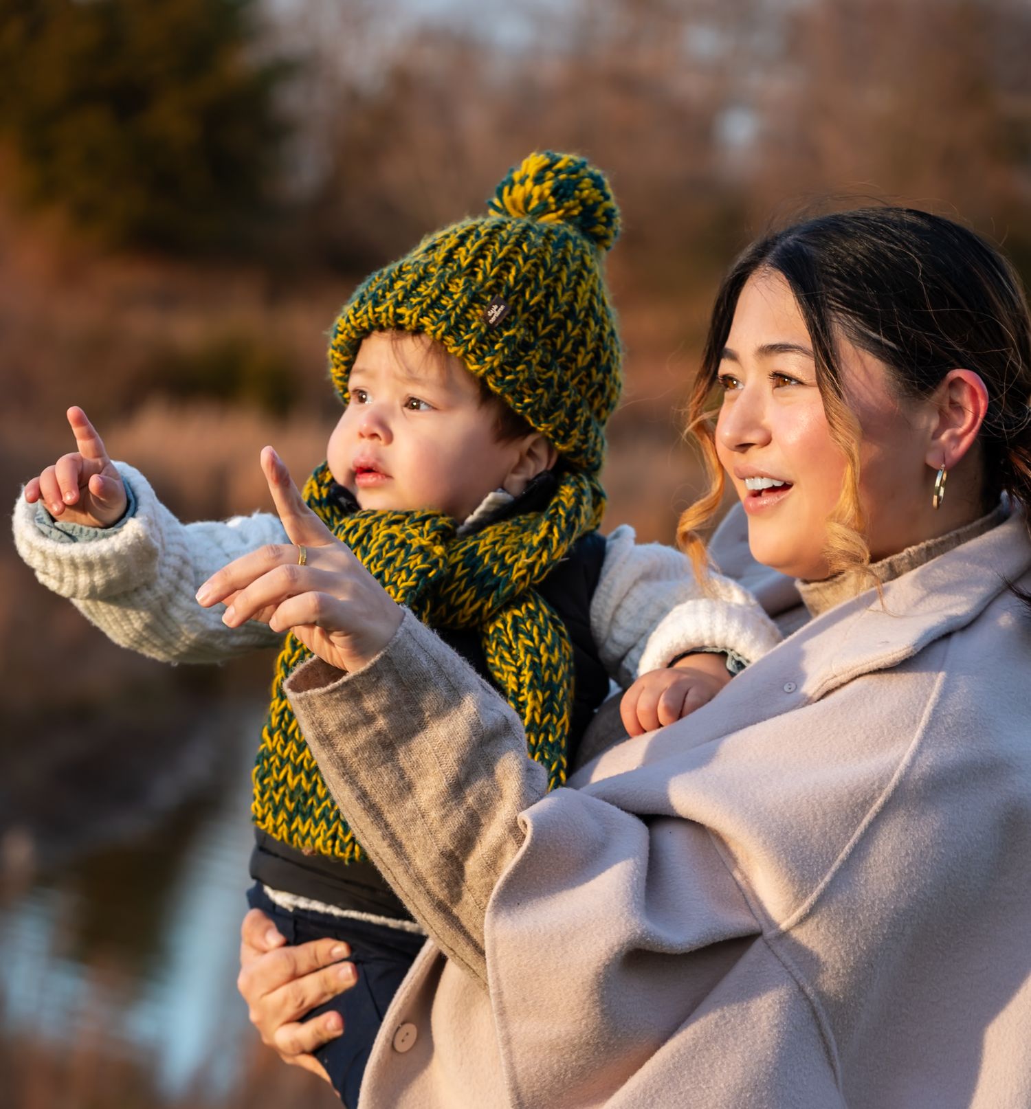 Outdoor portrait of a two-year-old boy with his mother, captured by ek-framedmemories in Northern Virginia