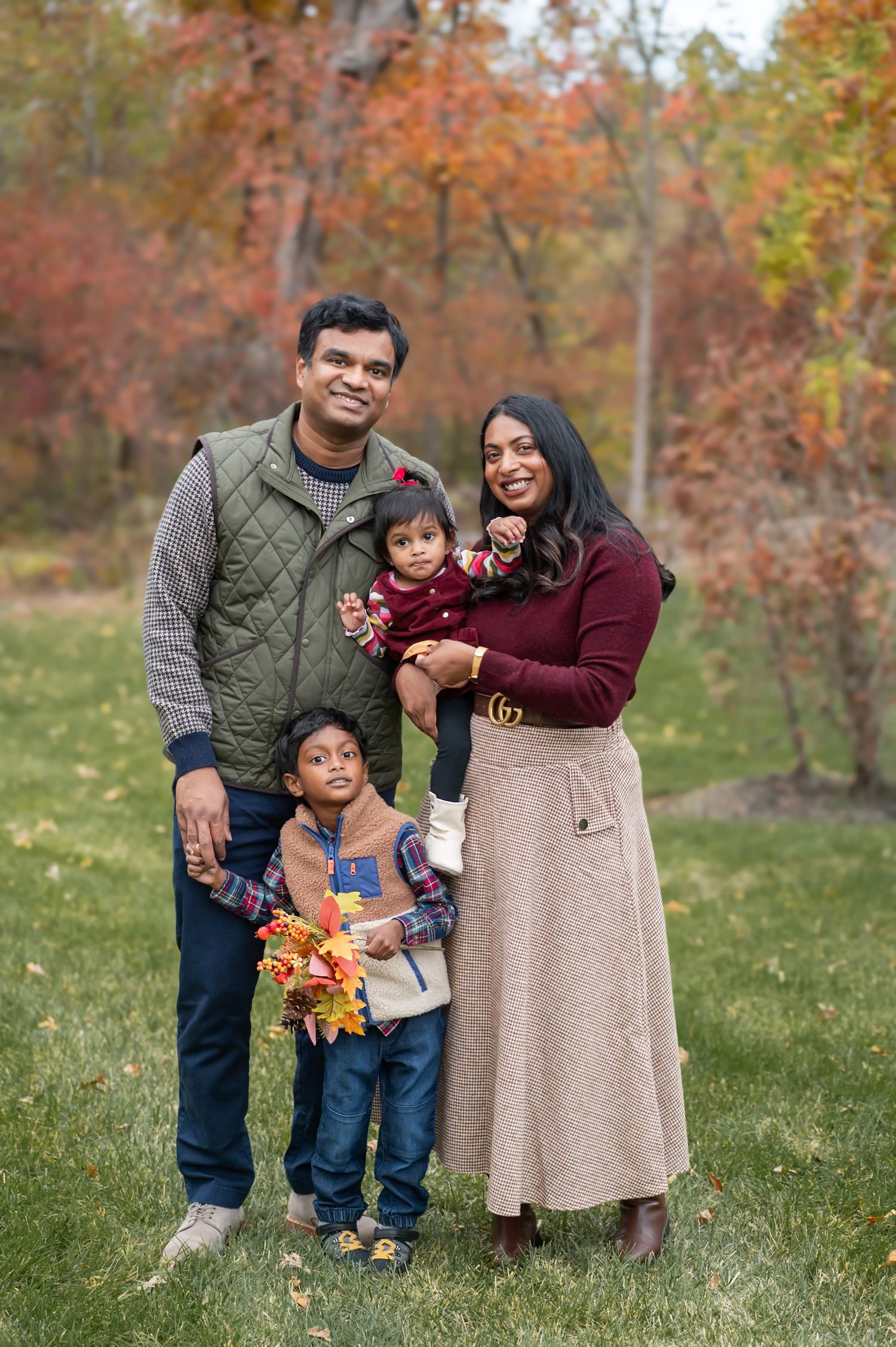 Fall family portraits with colorful autumn leaves in Northern Virginia
