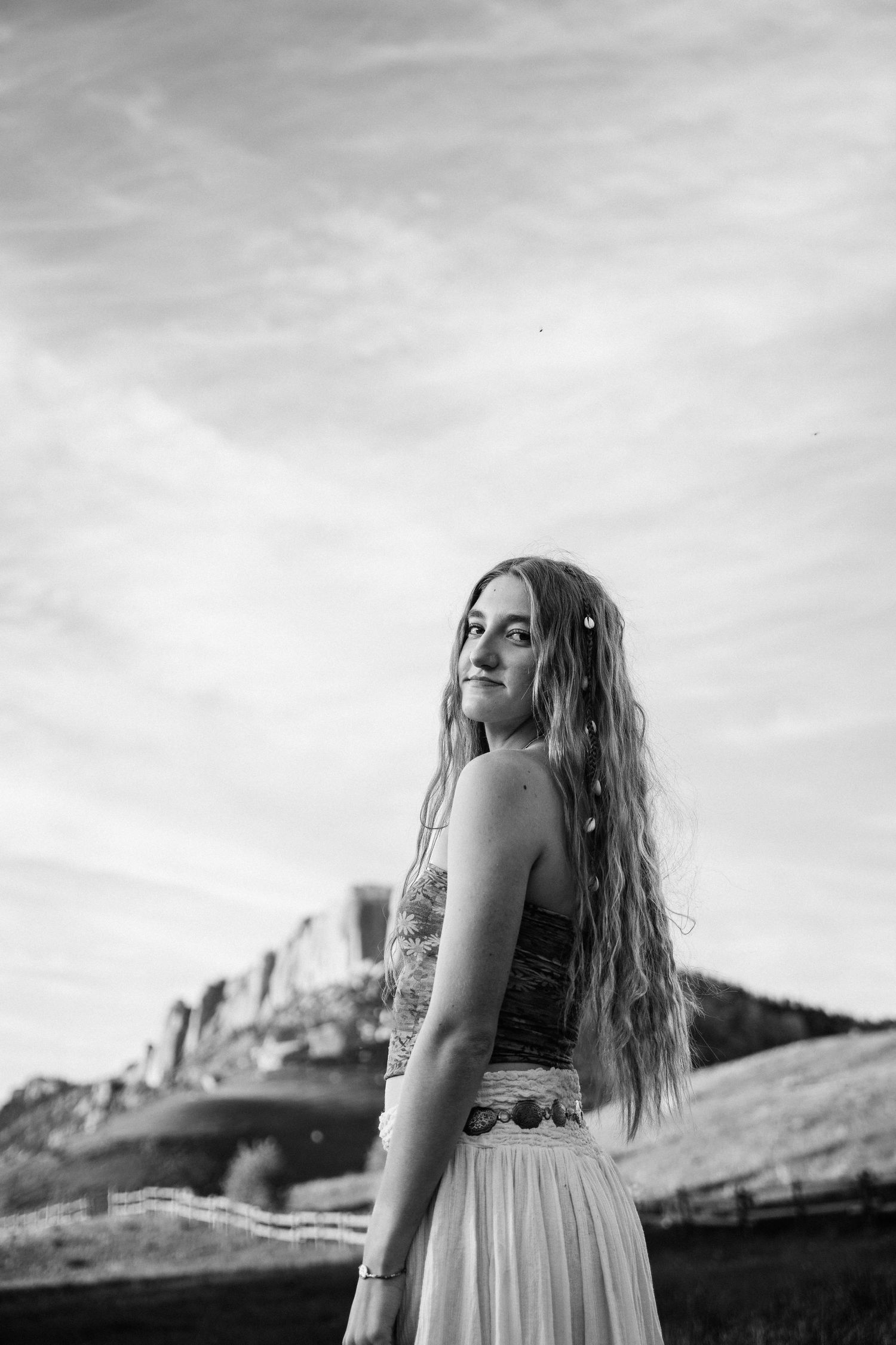 Senior posing in front of mountain