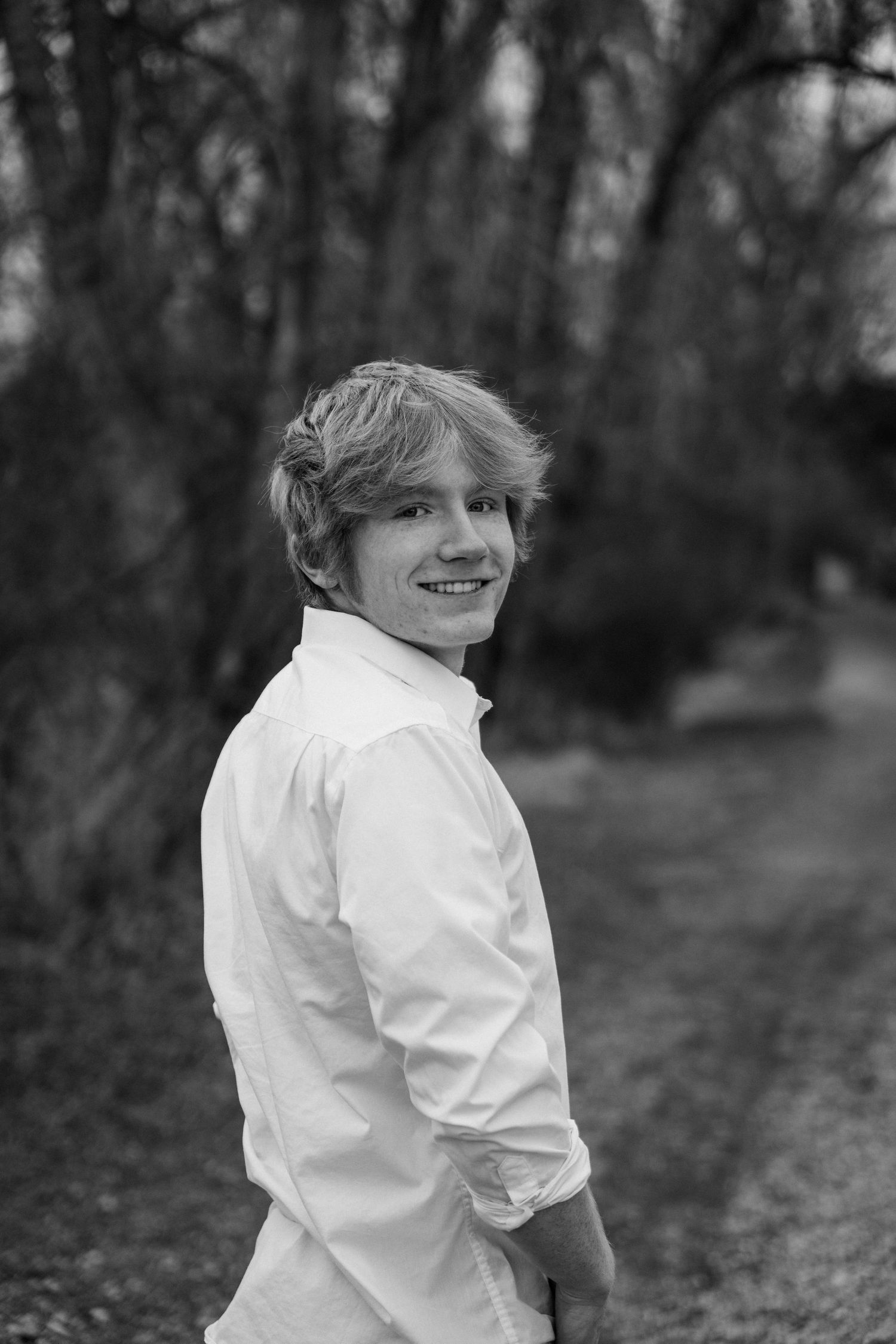 Man looking over his shoulder for senior portraits