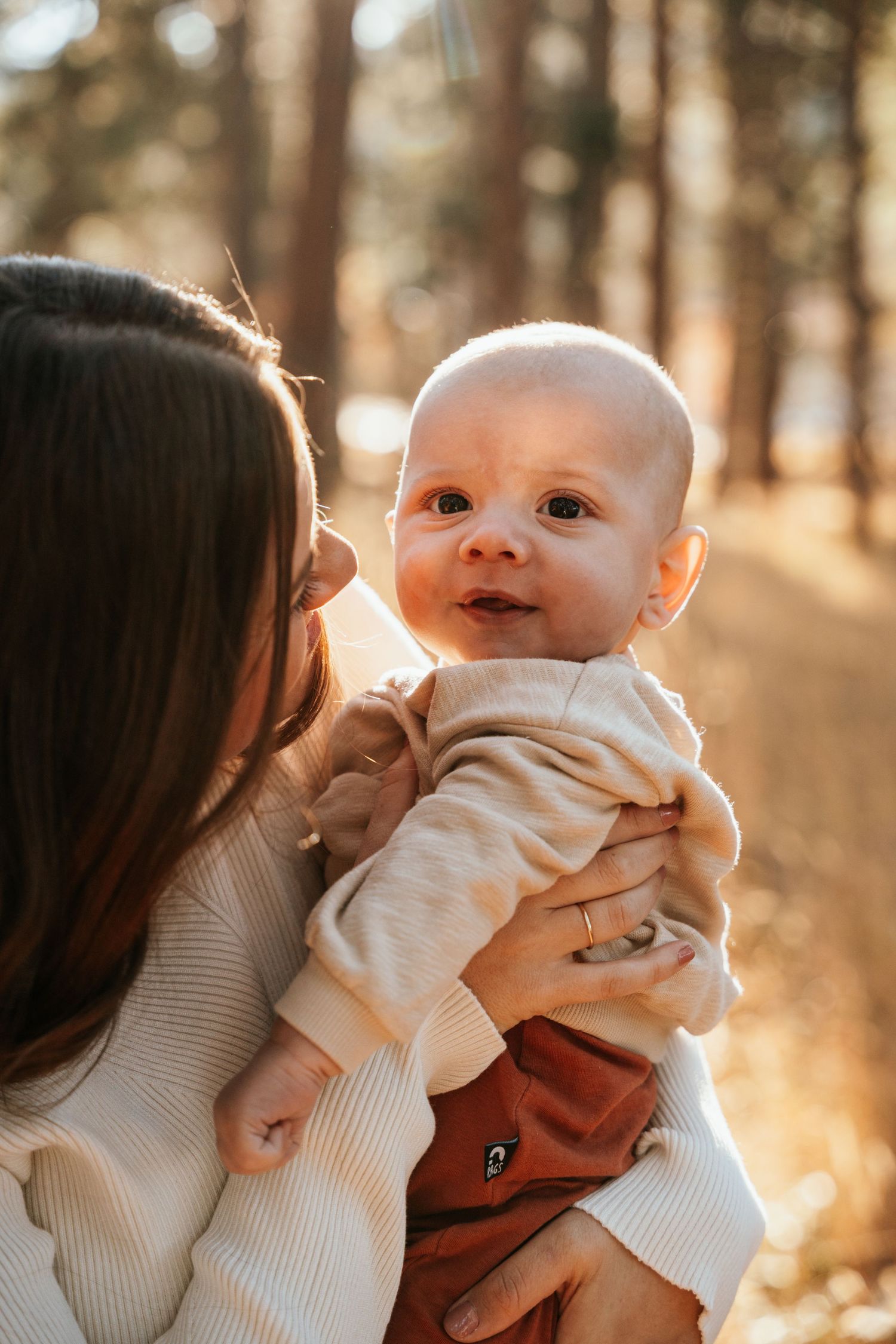 Photo of baby looking at camera.