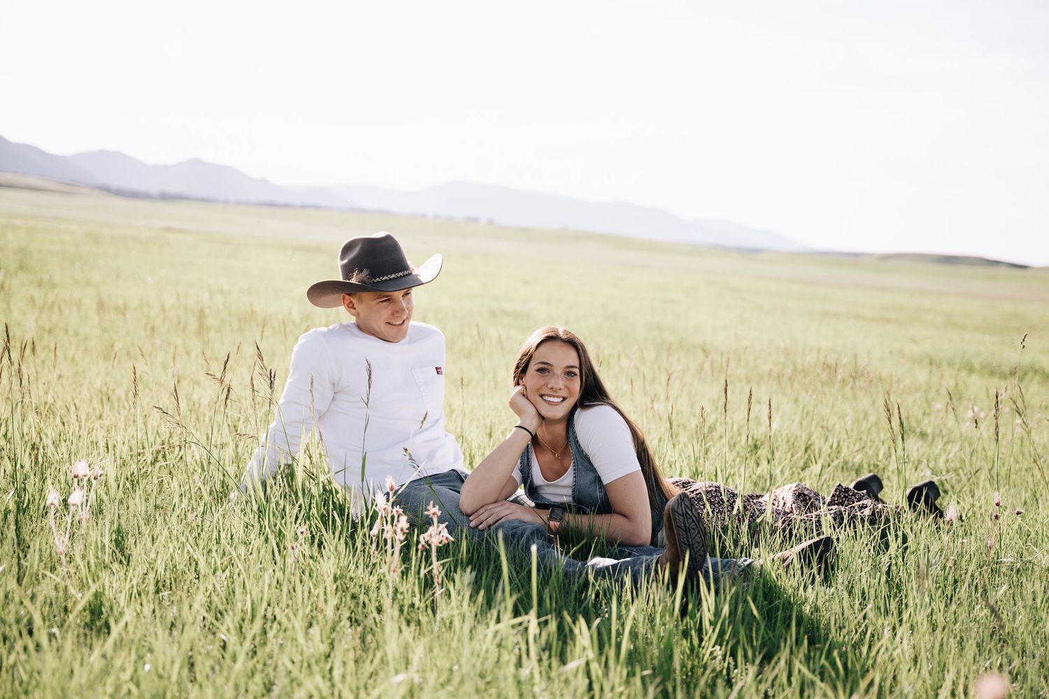 Couple session in the middle of a green field.