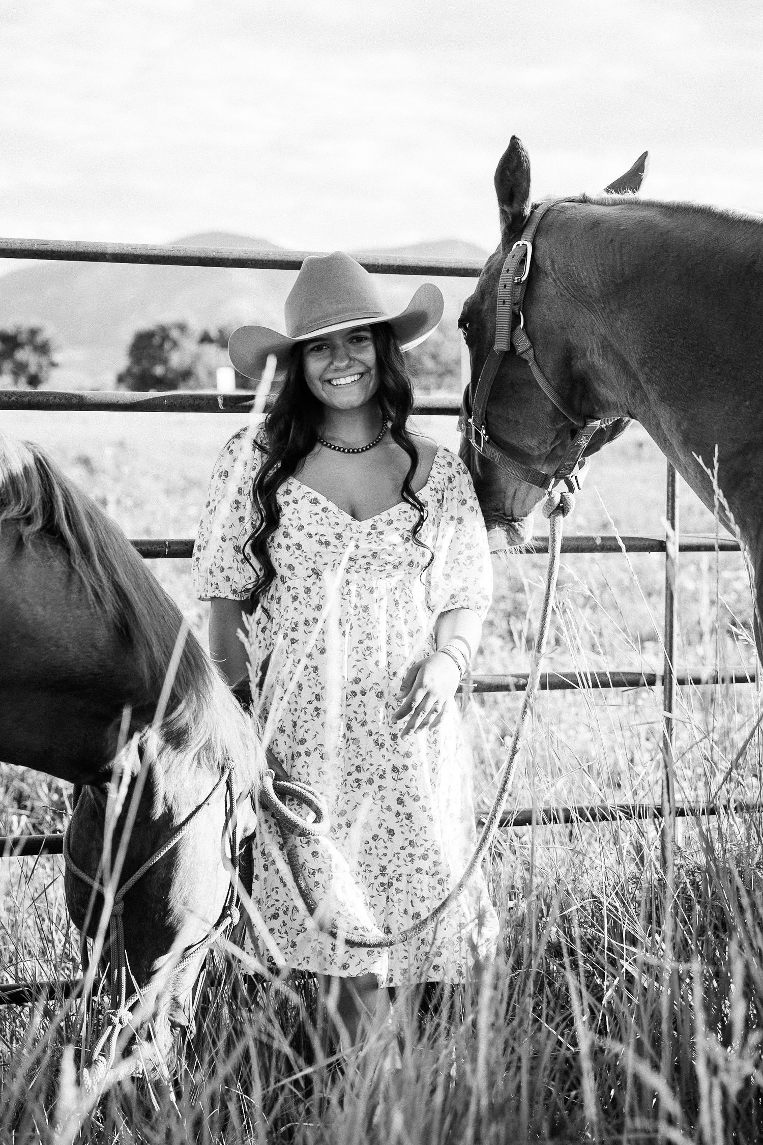 Girl standing next to a horse