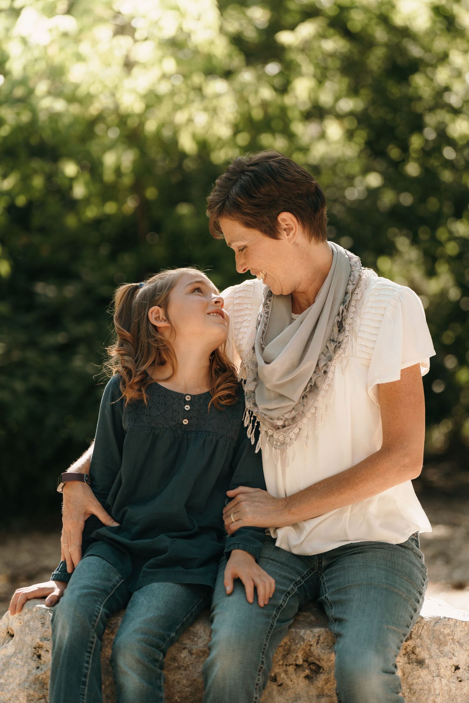 Mom posing with one of her daughters.