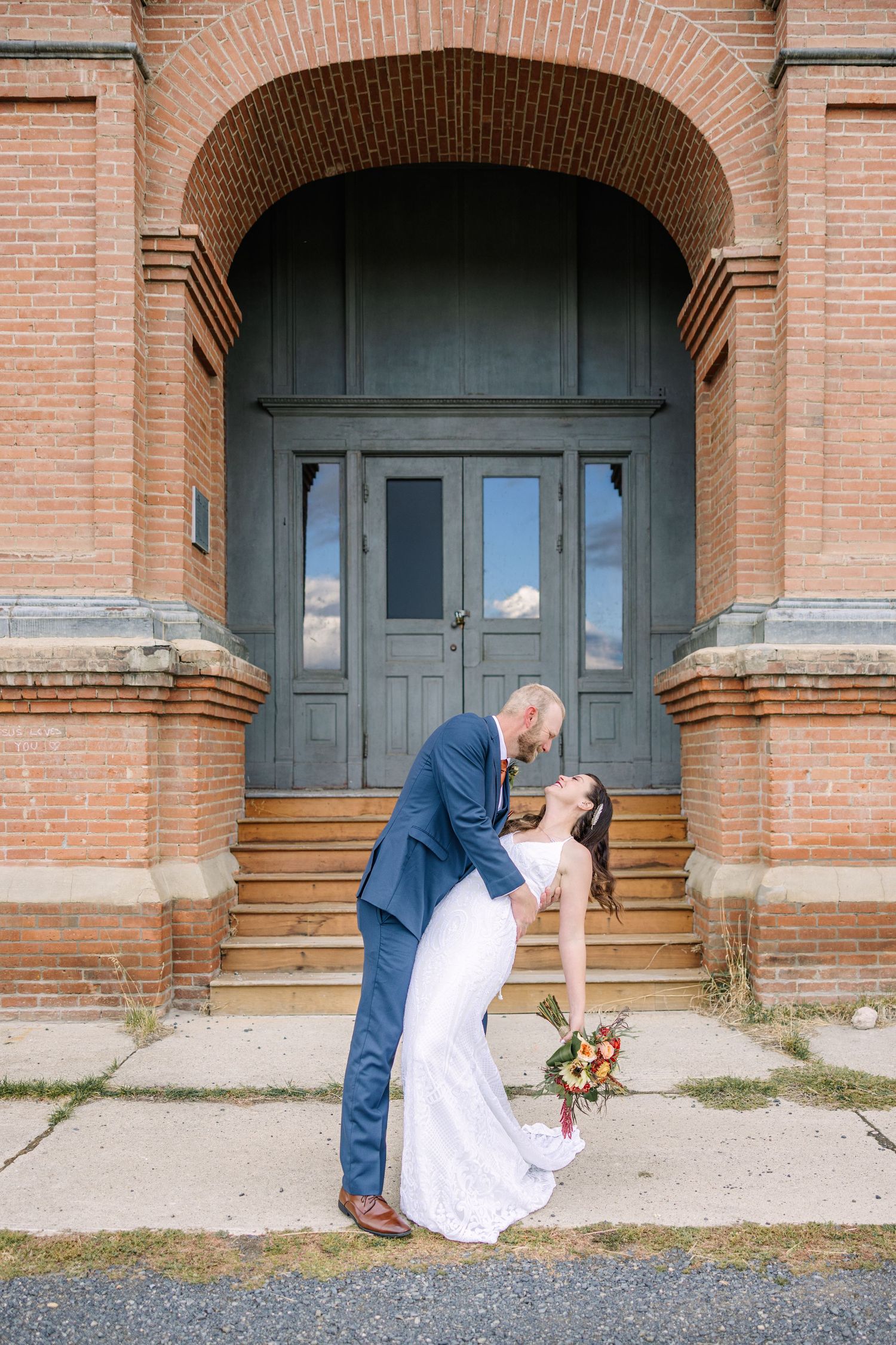 Four sequential photos showing a romantic dip pose in front of a historic brick building with arched doorways.