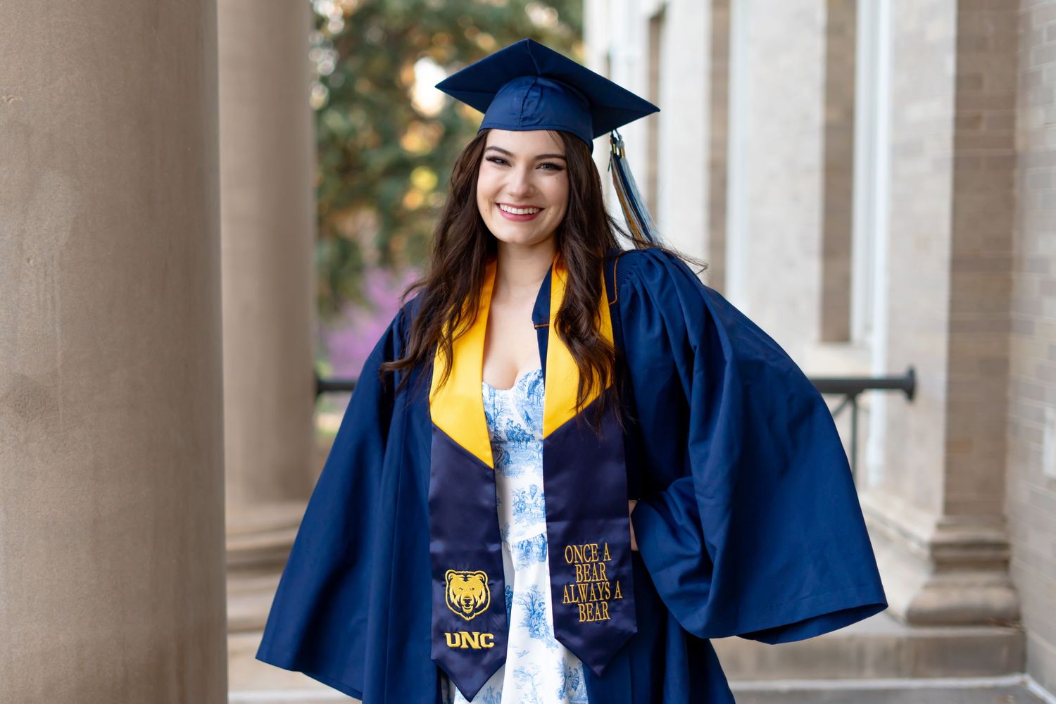 Collegiate columns and architecture create elegant backdrop for graduation photos.