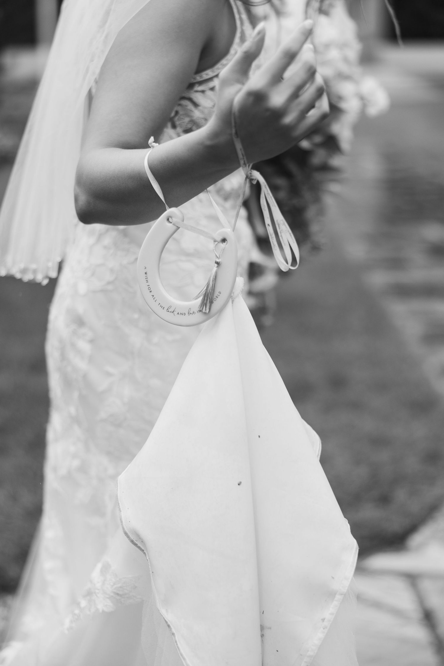 Black and white detail shots of a flowing wedding dress in motion.
