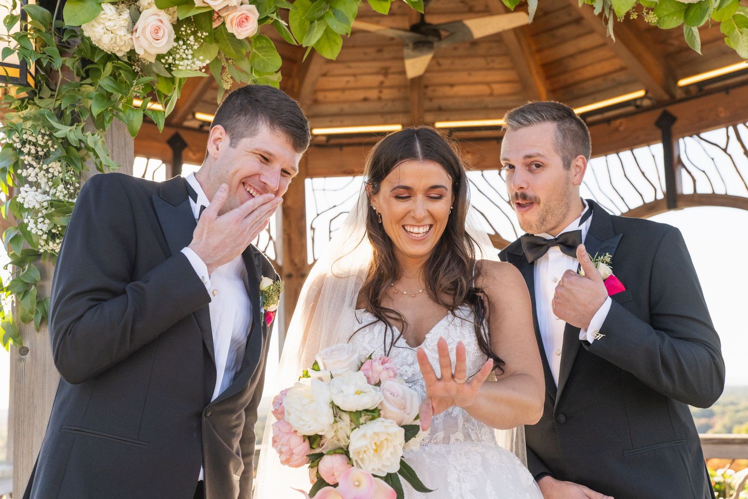 Collage of romantic wedding moments showing couples embracing and laughing together under a rustic wooden pavilion.
