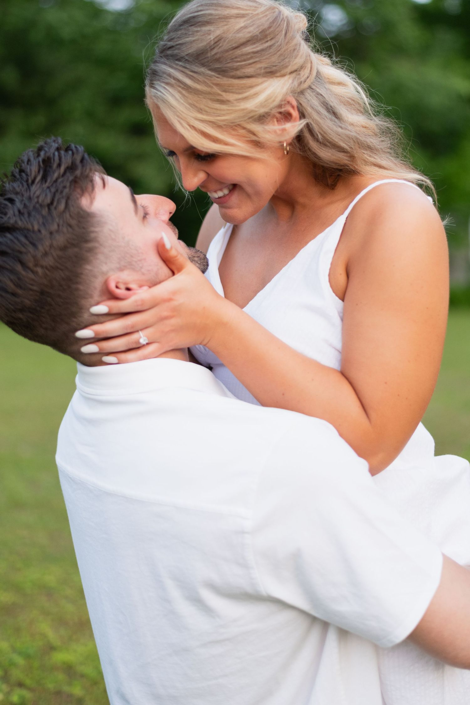 A tender embrace captured in a series of intimate outdoor portrait photos.