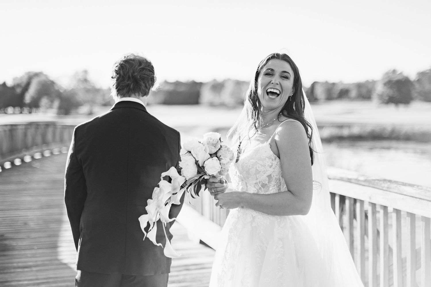 A black and white wedding photo collage showing romantic moments between a couple on their special day.