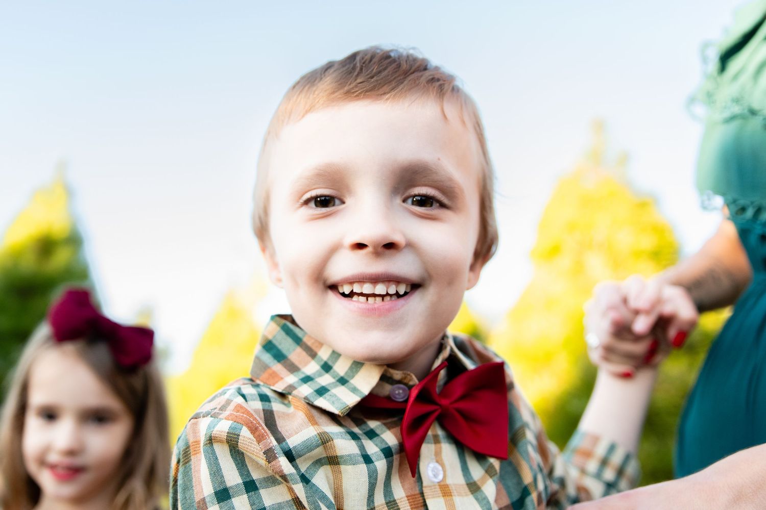 Cheerful series of expressions captured against a bright colorful background.