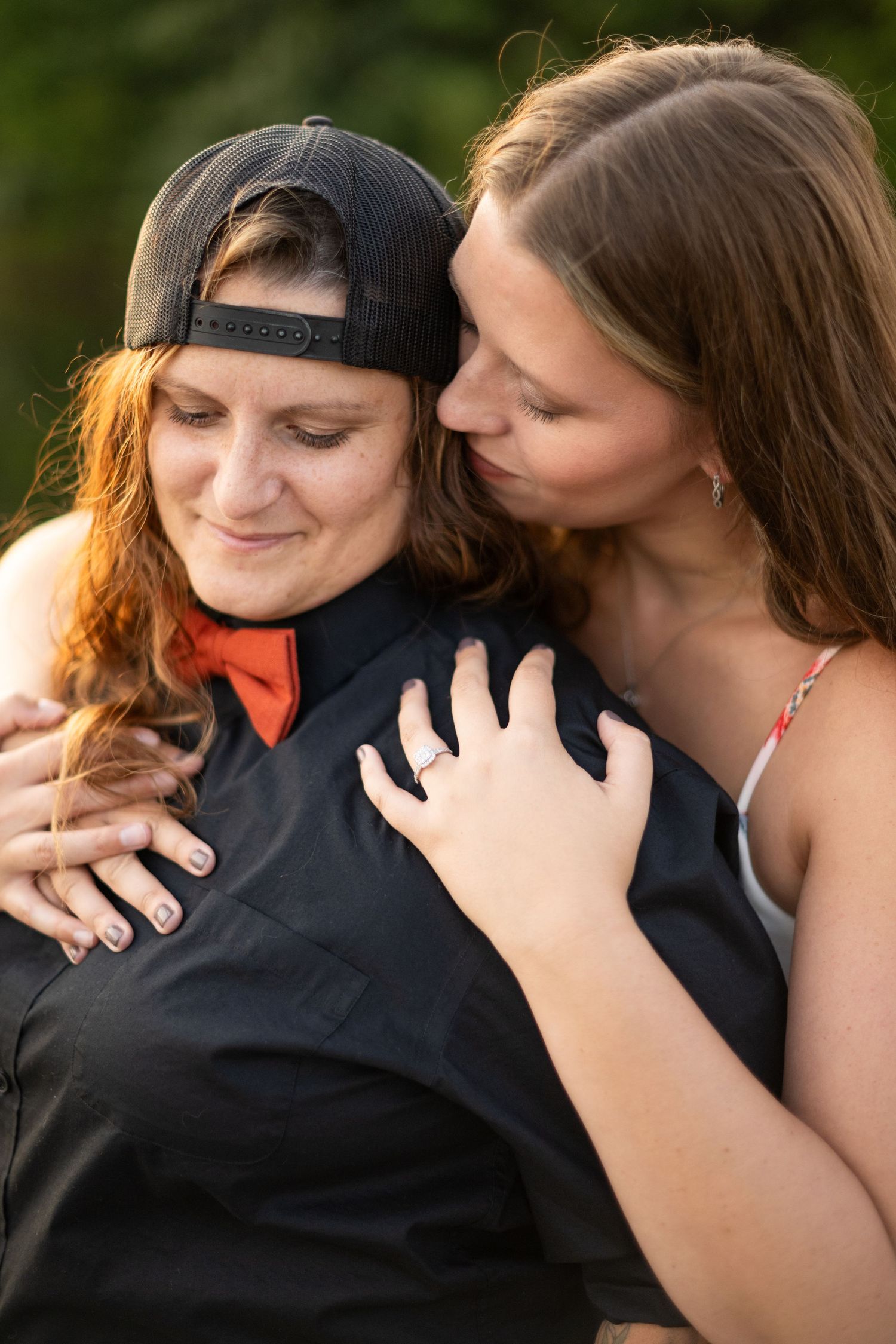Intimate couple photo sequence showing tender moments and kisses in outdoor setting.