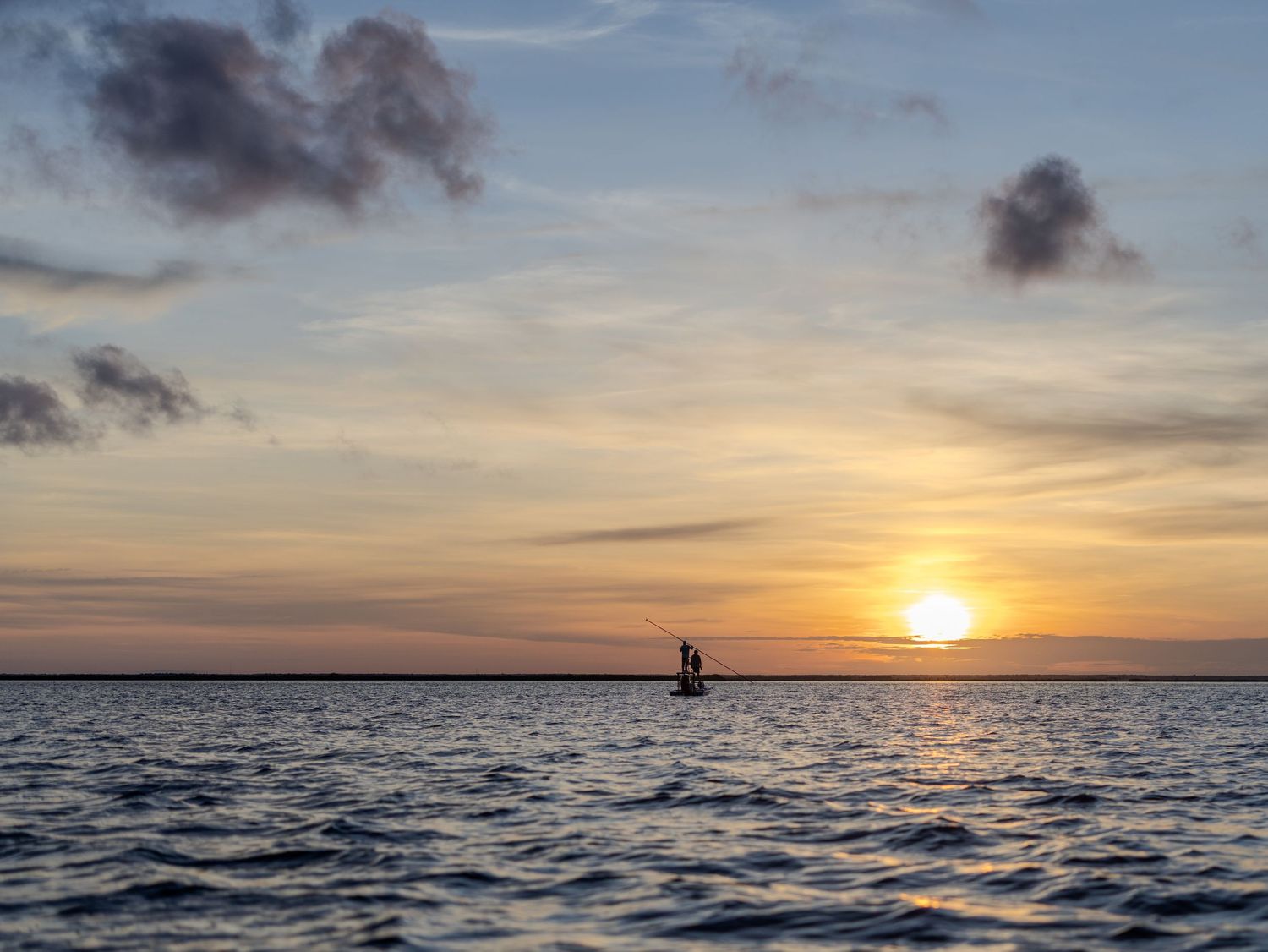 Guide and Angler at Sunrise