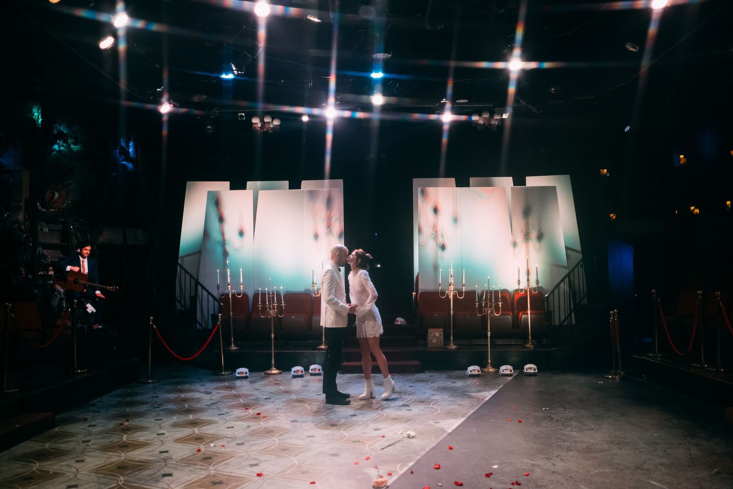A bride and groom kiss during a cinematic wedding ceremony in Glendale.
