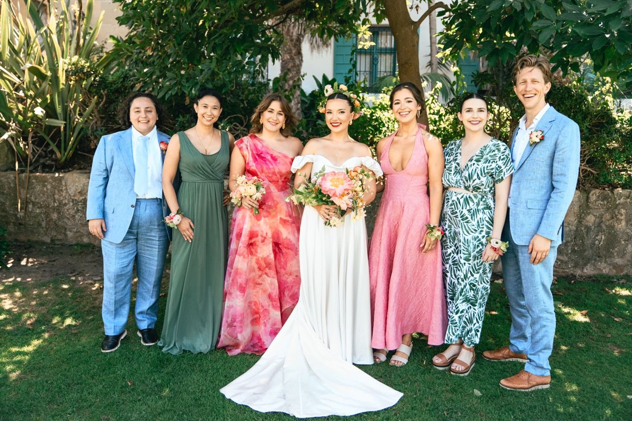 Bride and wedding party portrait.