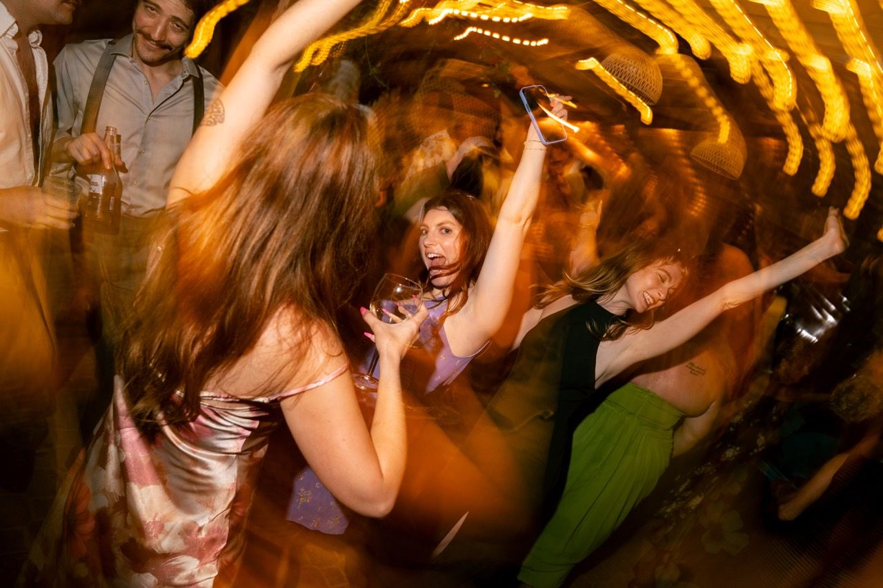 Slow shutter flash at wedding reception dance.