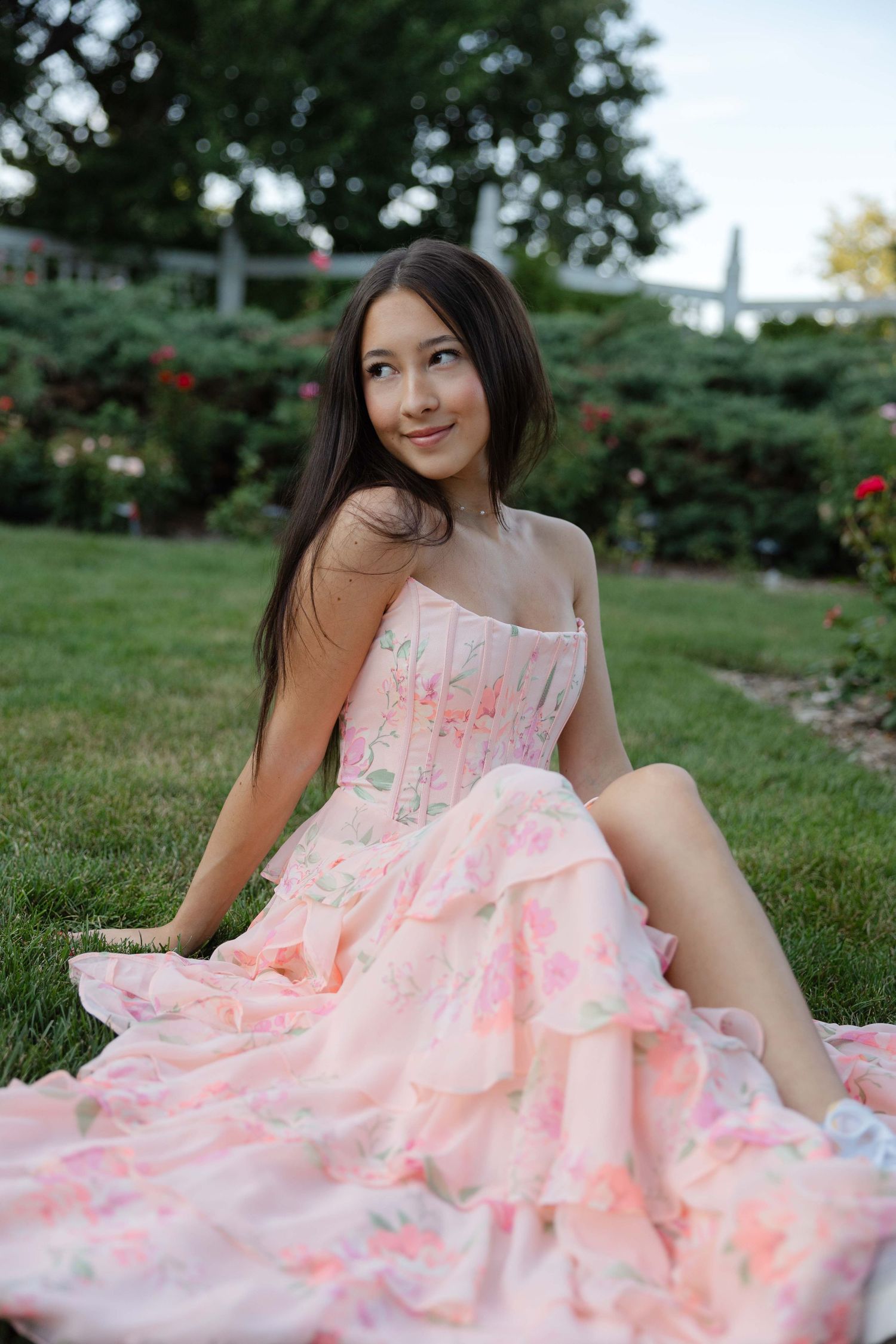 High school senior posing in a flower garden in Minnesota