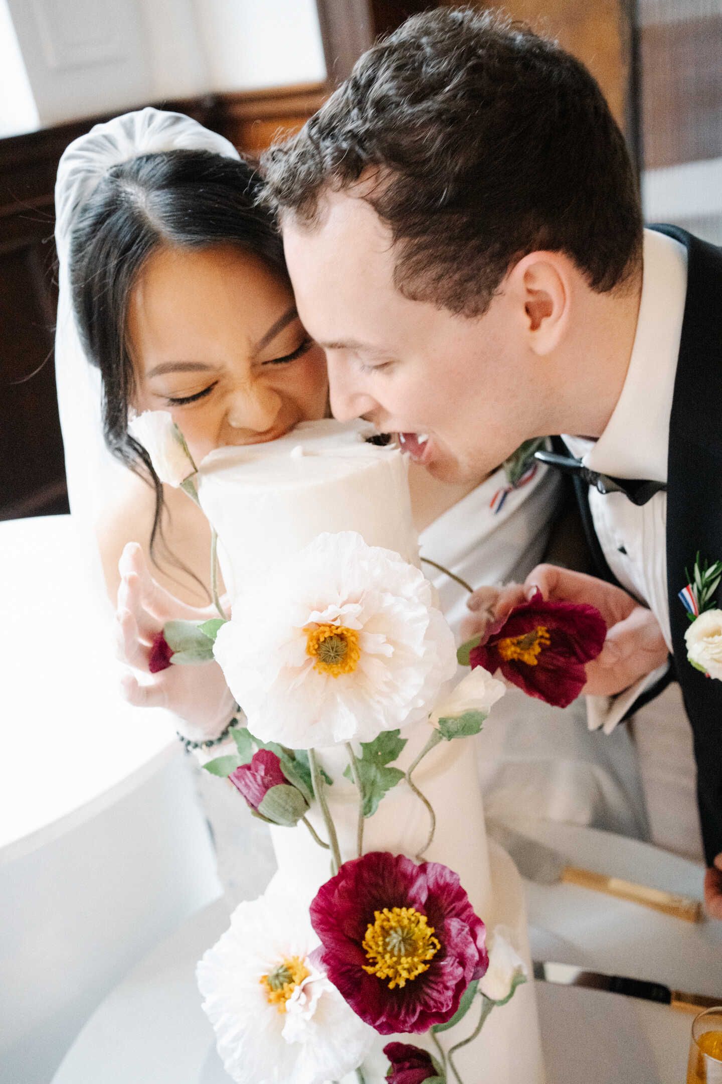 Michelle & luke eating cake tower at their wedding ceremony held at the trust Melbourne, run by nudo weddings. Photo by whysogeneric.