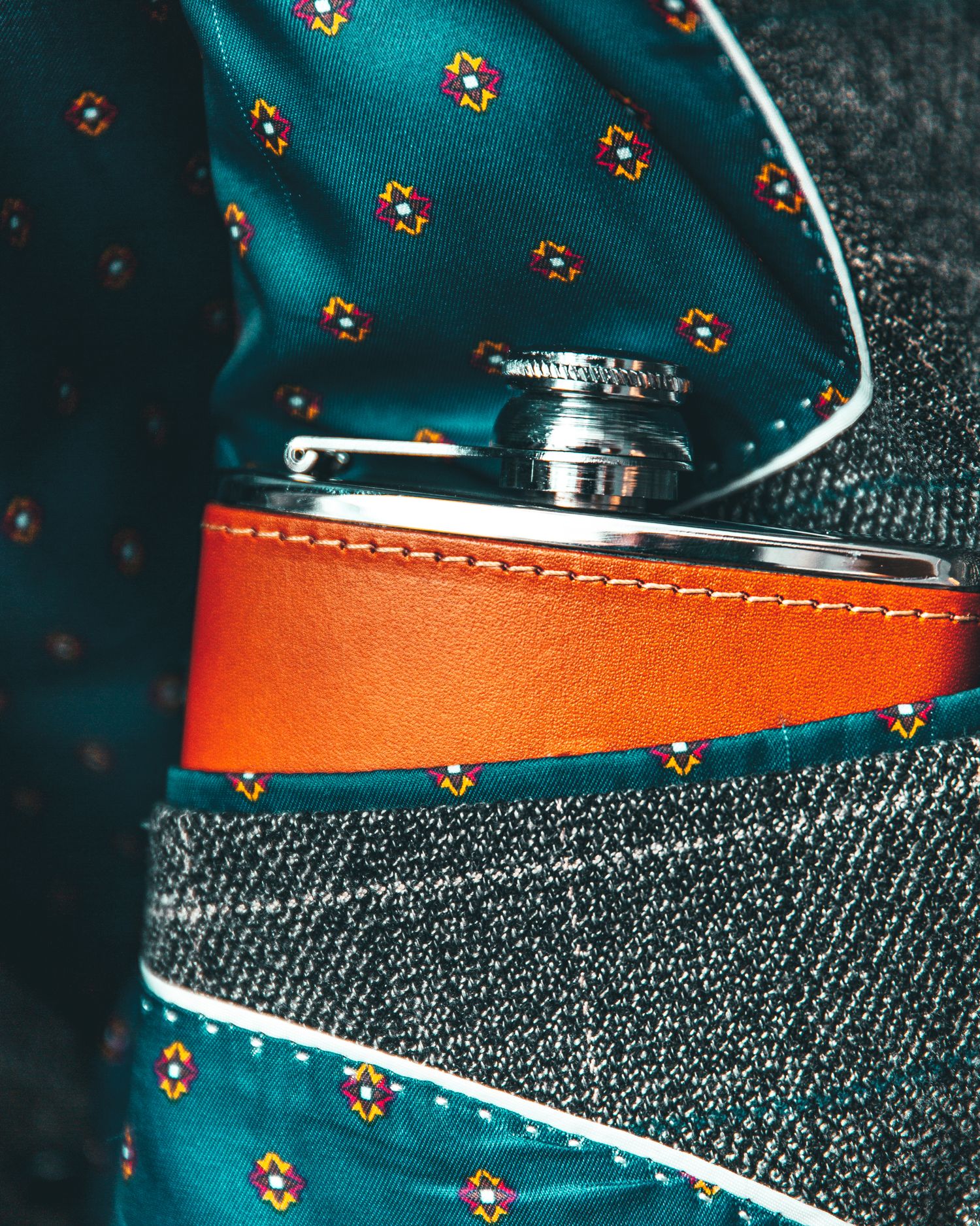 leather hip flask in a gentlemans pocket