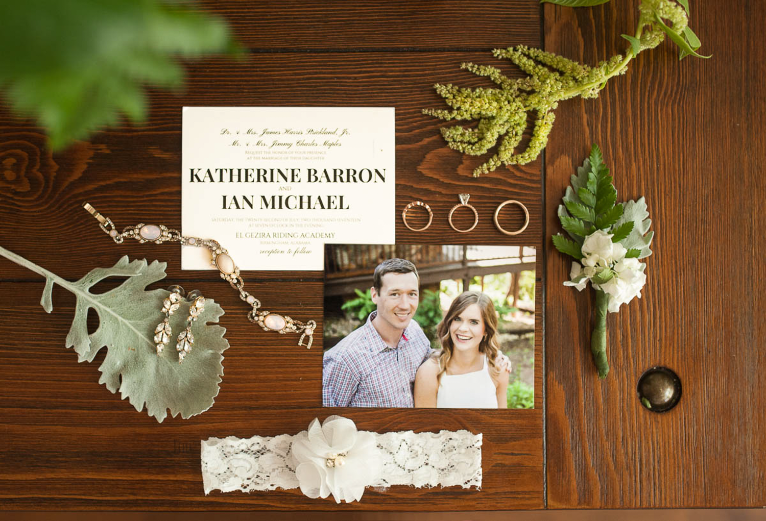 Lay flat image of wedding invitation and details in wedding in Alabama.