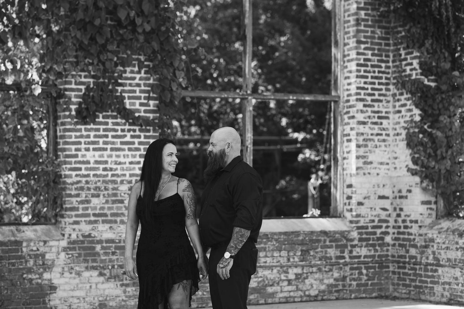 Black and white shot of couple in engagement session in Rome, GA.