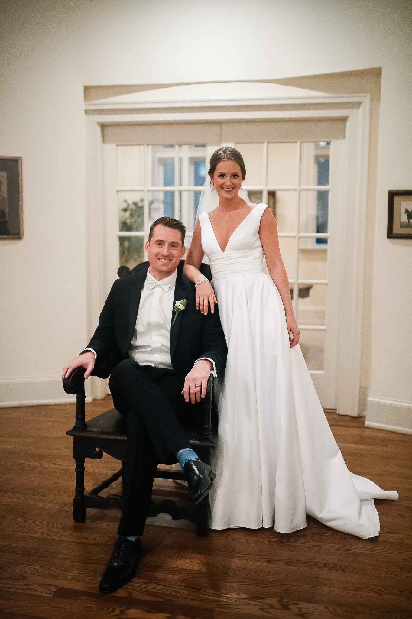 Indoor bridal portrait with bride and groom seated formally at Wimbish House in Atlanta, GA.