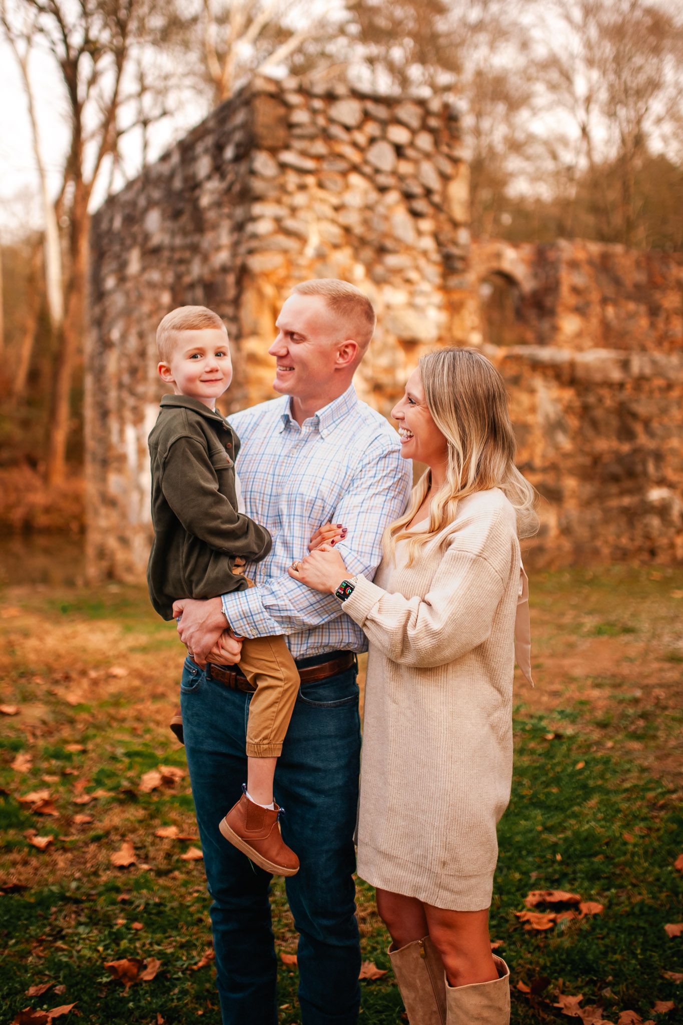 Full family portrait of mom, dad, and young son for Christmas cards in Cartersville, GA.