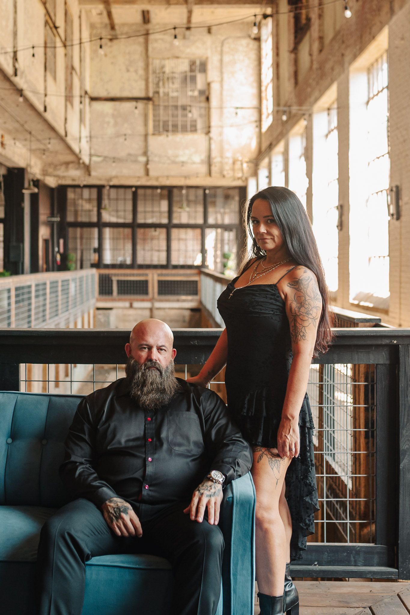Close up shot of couple in moody industrial engagement session at Lindale Mill in Rome, GA.