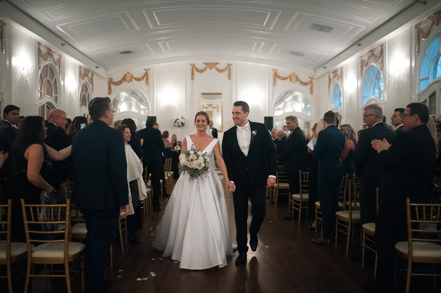 Bride and groom walking down the aisle at Wimbish House in Atlanta, GA.