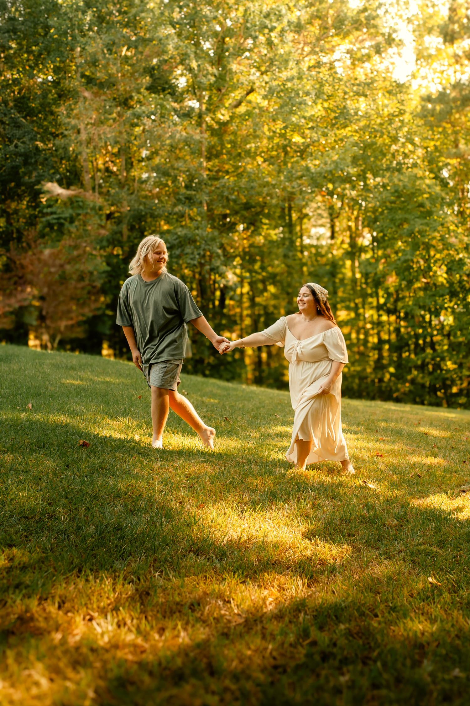 Mom and son holding hands for family photos in Cartersville, GA.