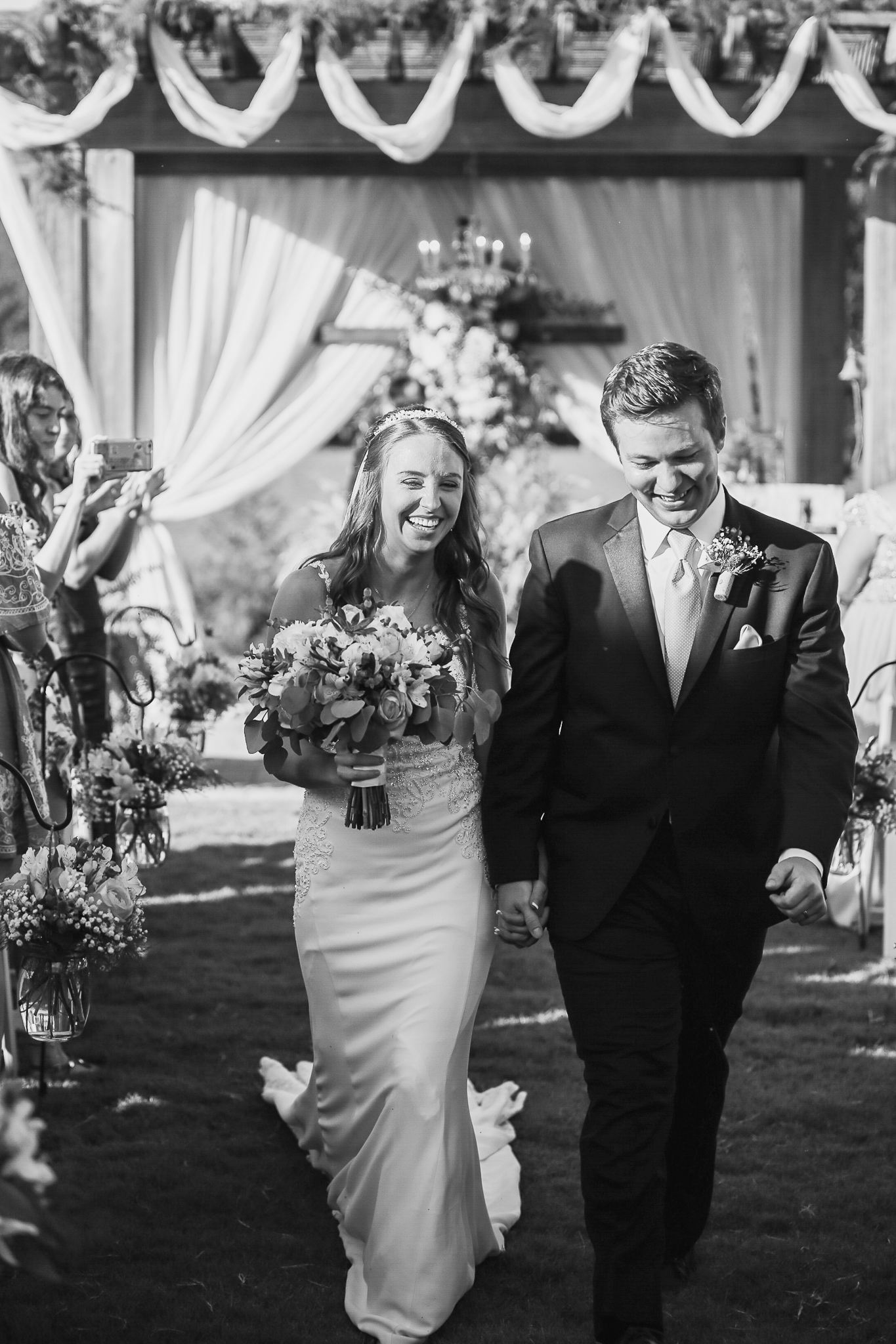 Bride and groom walking down the aisle after the ceremony in Northwest Georgia.