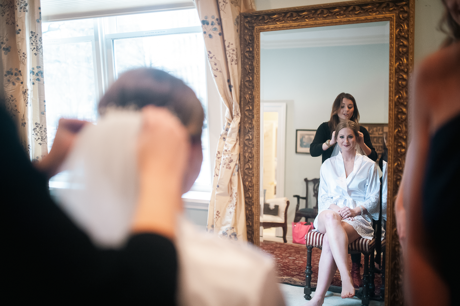 Bride seeing herself get her veil put on during winter wedding at Wimbish House in Atlanta, GA.
