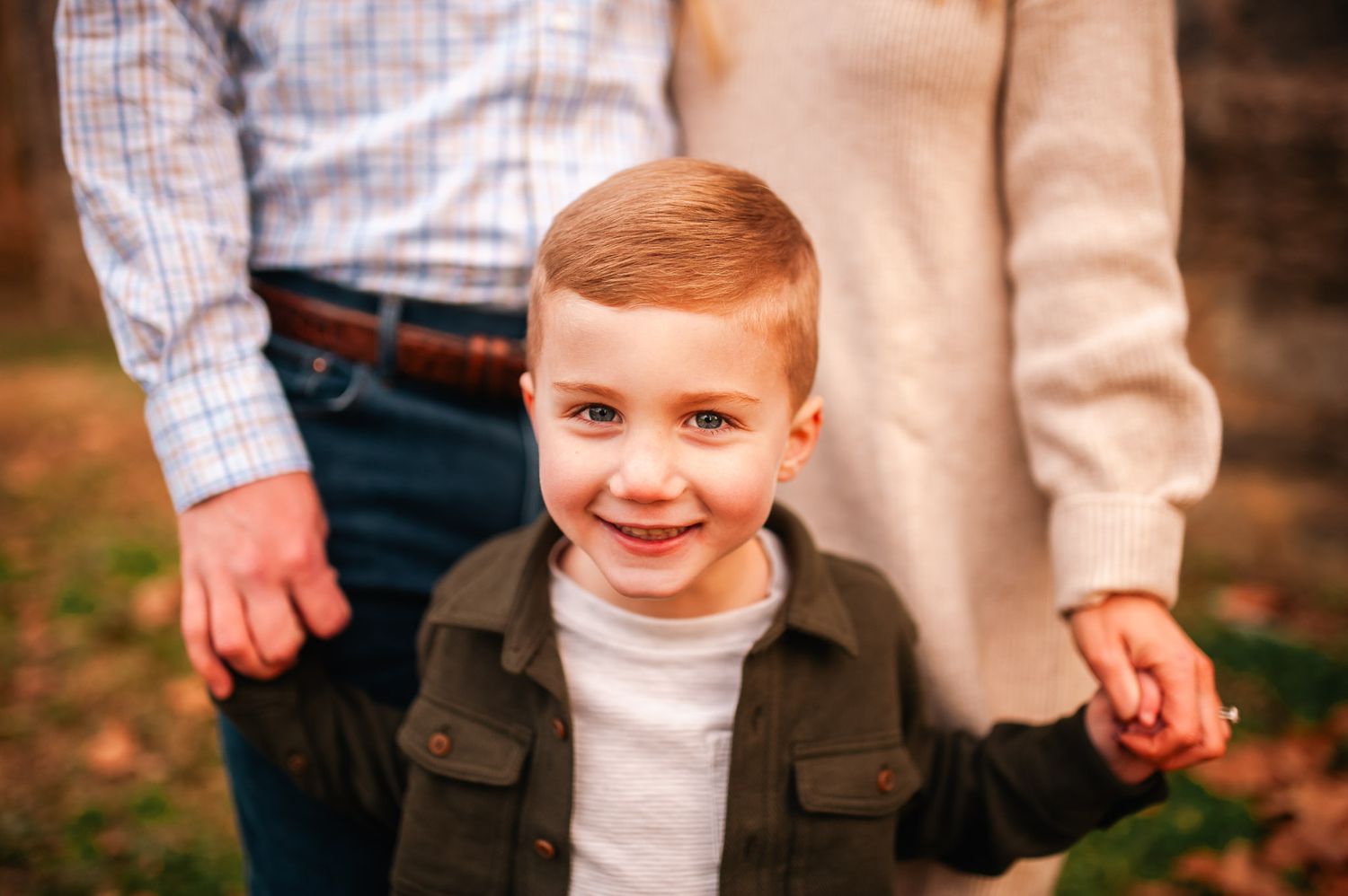 Close up personality shot of young boy in family photoshoot for Christmas cards in Cartersville, GA.