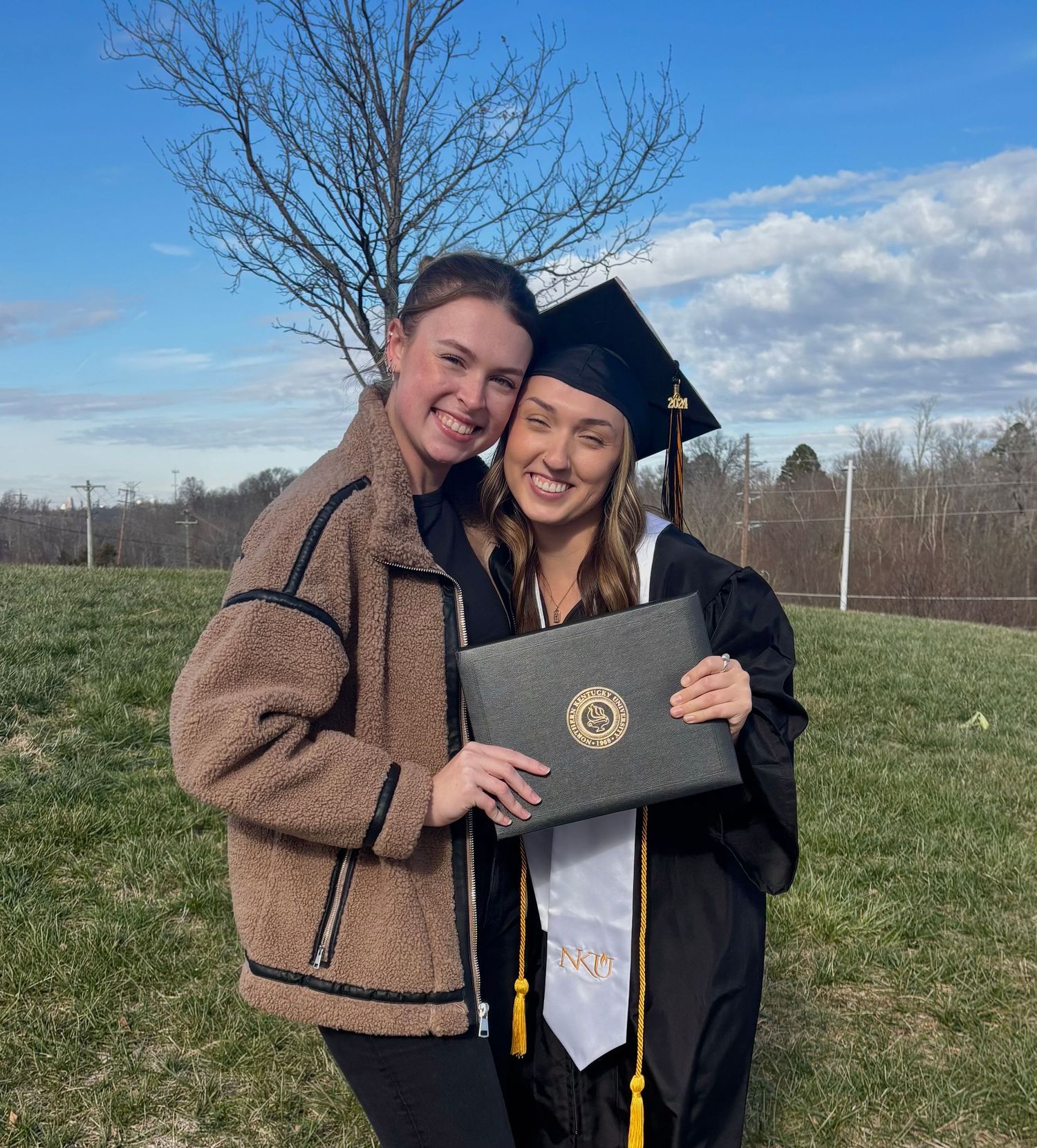 Cailee Mitchell (left) and Hailey Roden (right) after Hailey's graduation from NKU in 2024.