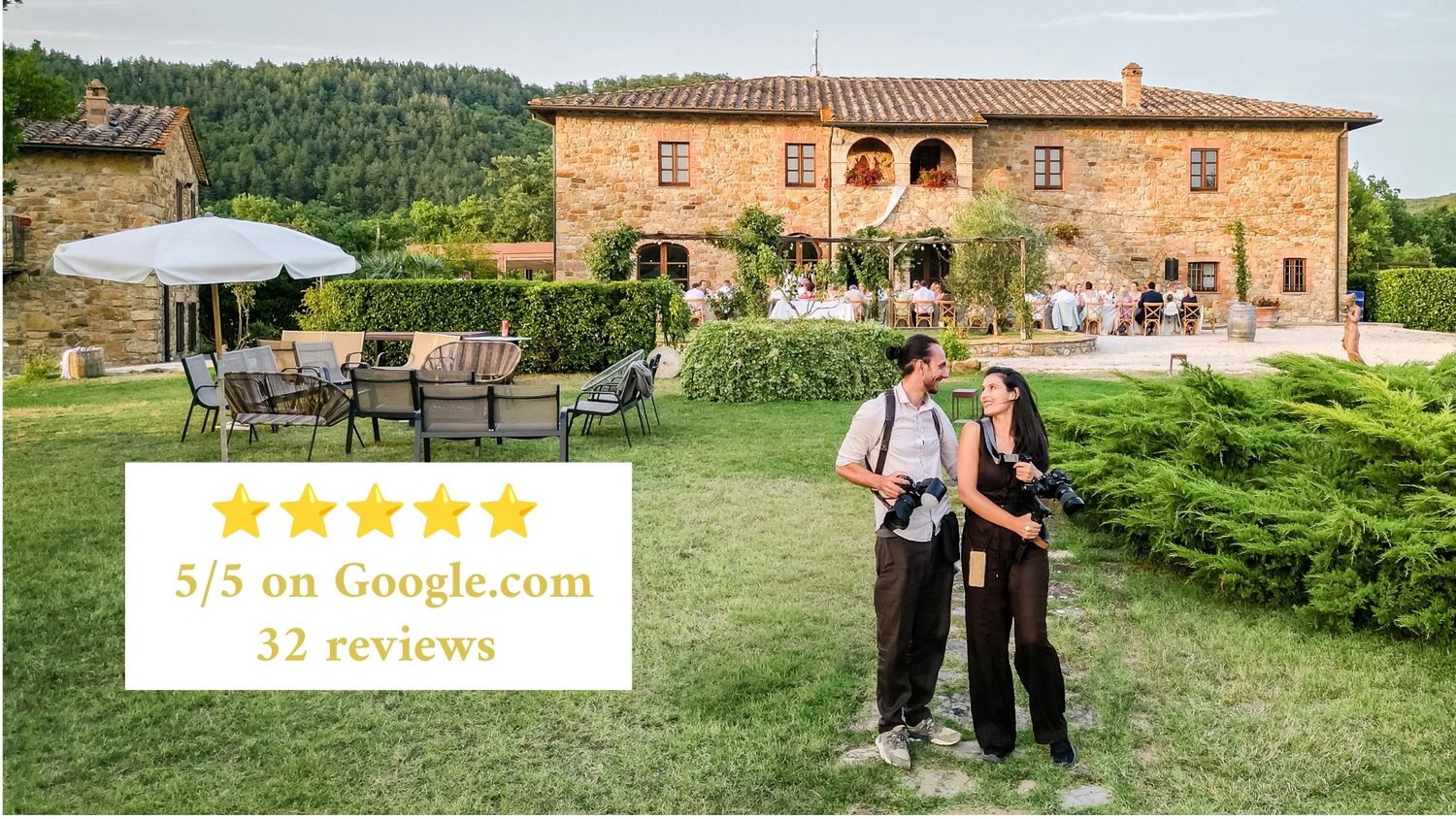 Tuscan villa with 5/5 Google reviews, couple standing on lush green lawn surrounded by cypress trees and stone architecture.