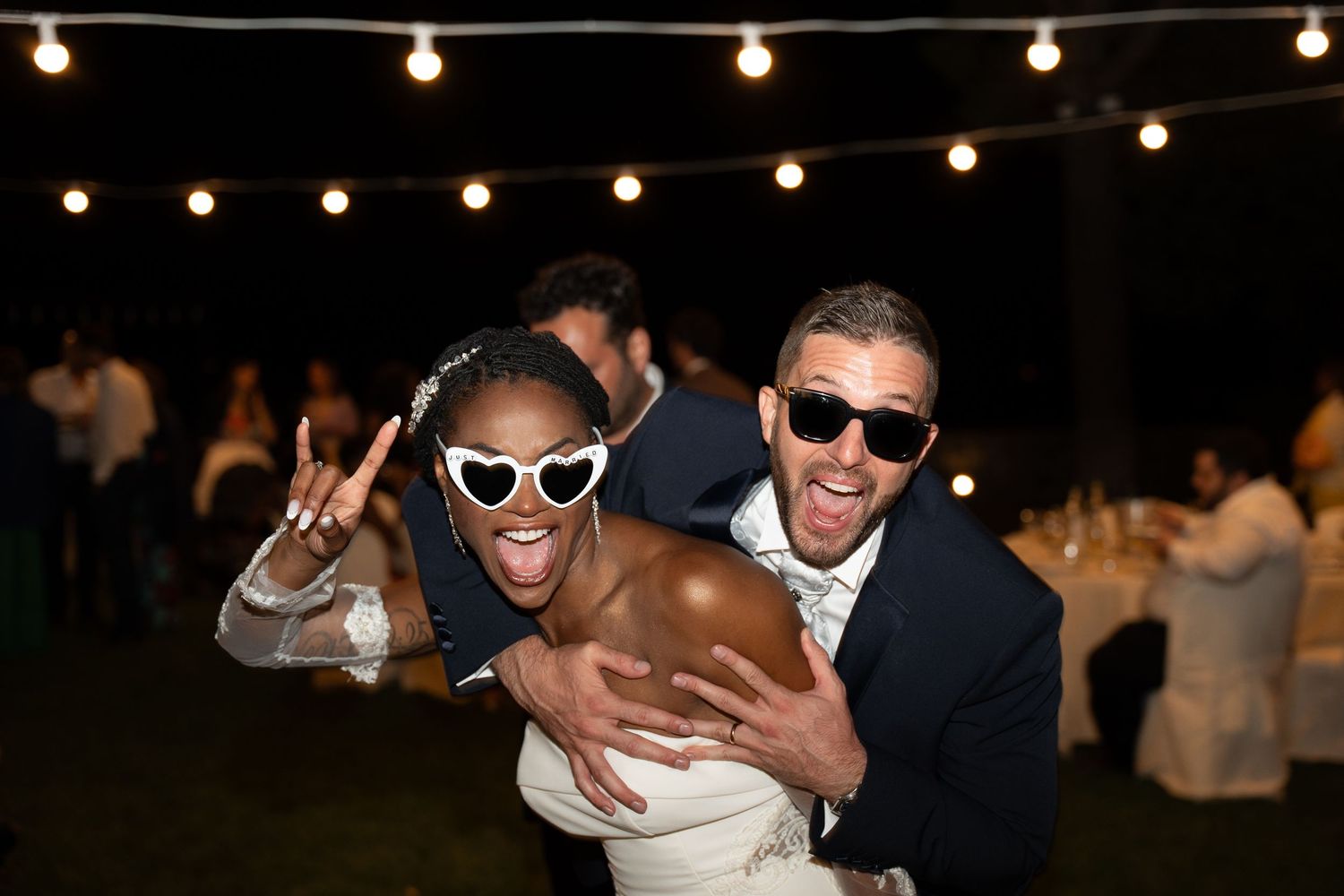 A series of candid party photos showing people dancing and celebrating under string lights at an outdoor event.