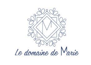 Elegant blue monogram logo design featuring the letter M in a decorative floral frame with French text below.