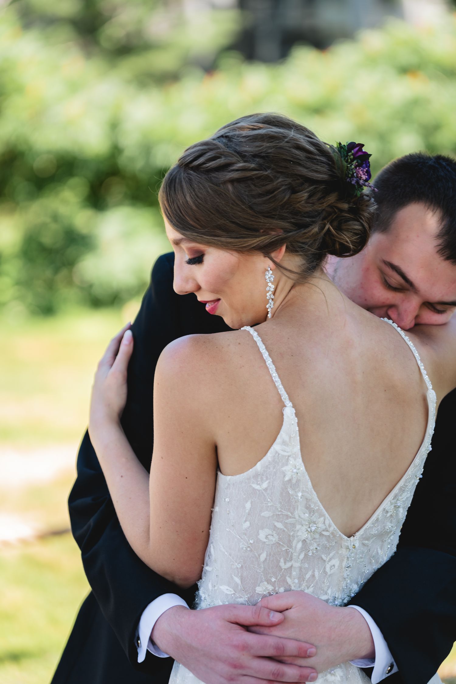 A romantic wedding photography series showing intimate close-up moments between newlyweds in an outdoor setting.