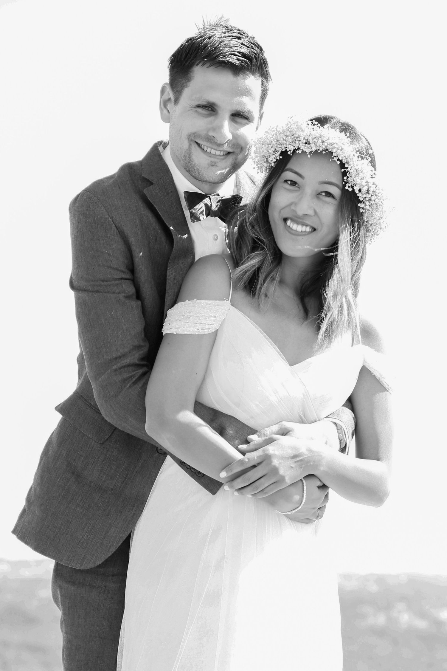 “Fun and joyful wedding photo in Italy capturing natural, playful, and loving moments of the bride and groom.”