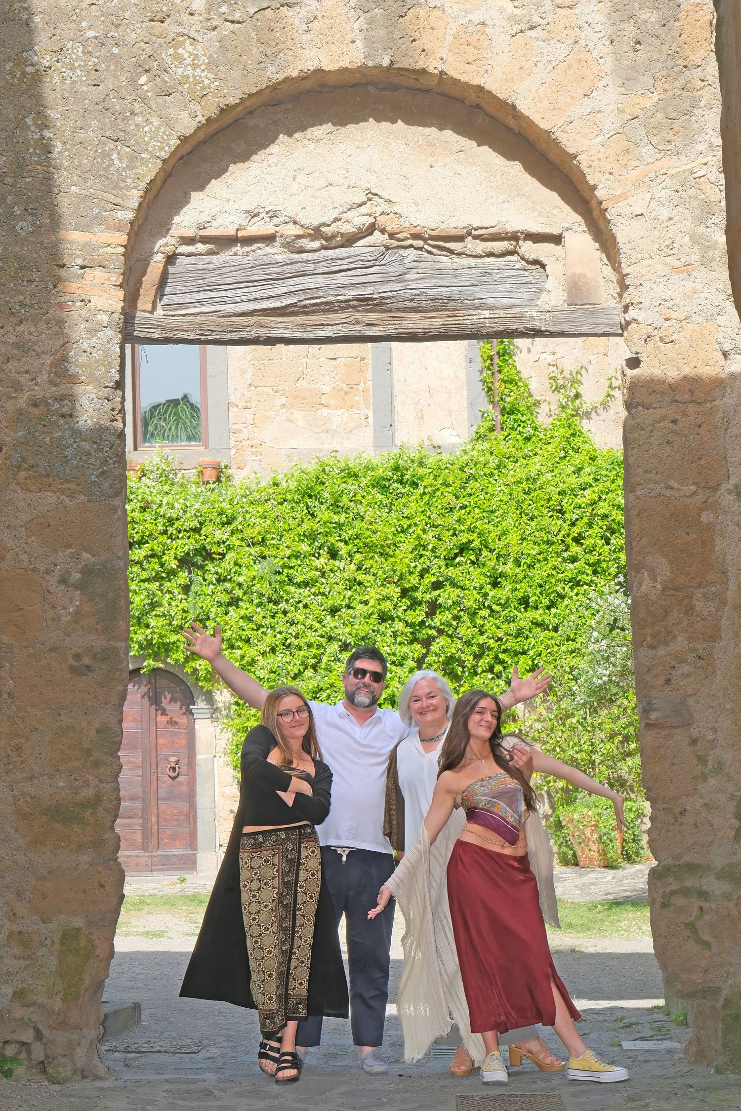 “Joyful family lifestyle photo in Italy capturing playful, natural moments with children and parents in Umbria and Tuscany.”