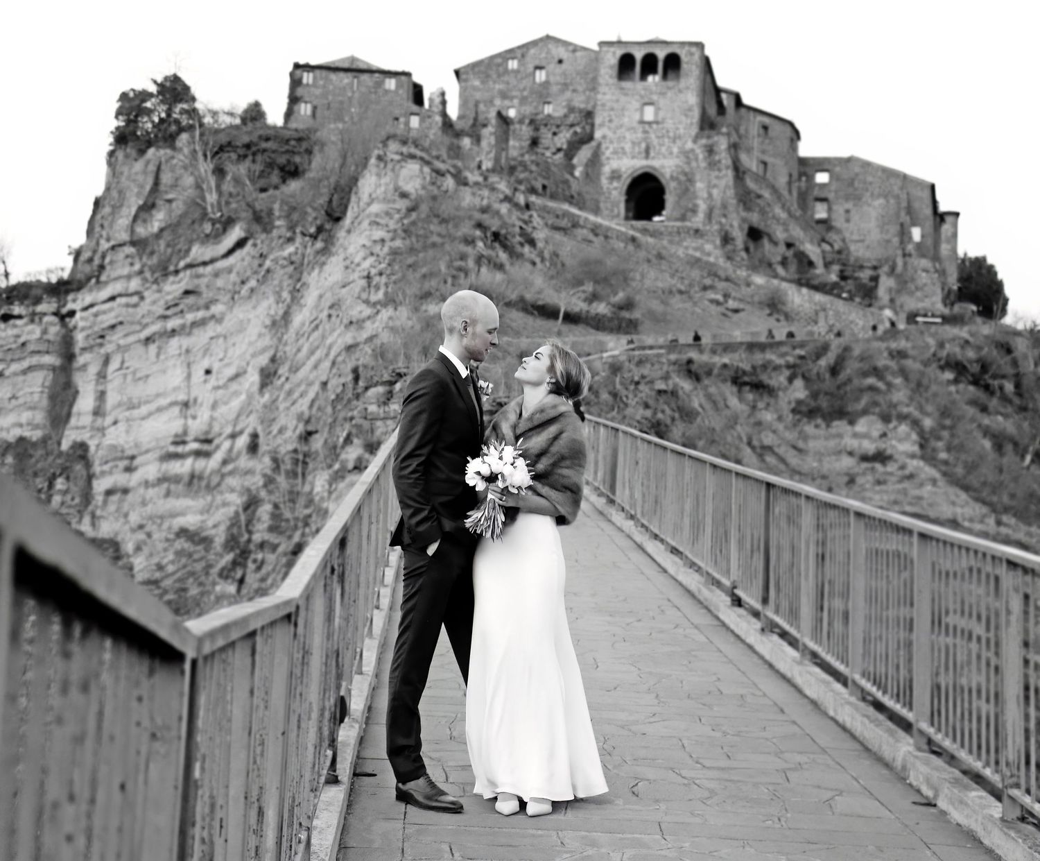 “Fun and joyful wedding photo in Italy capturing natural, playful, and loving moments of the bride and groom.”