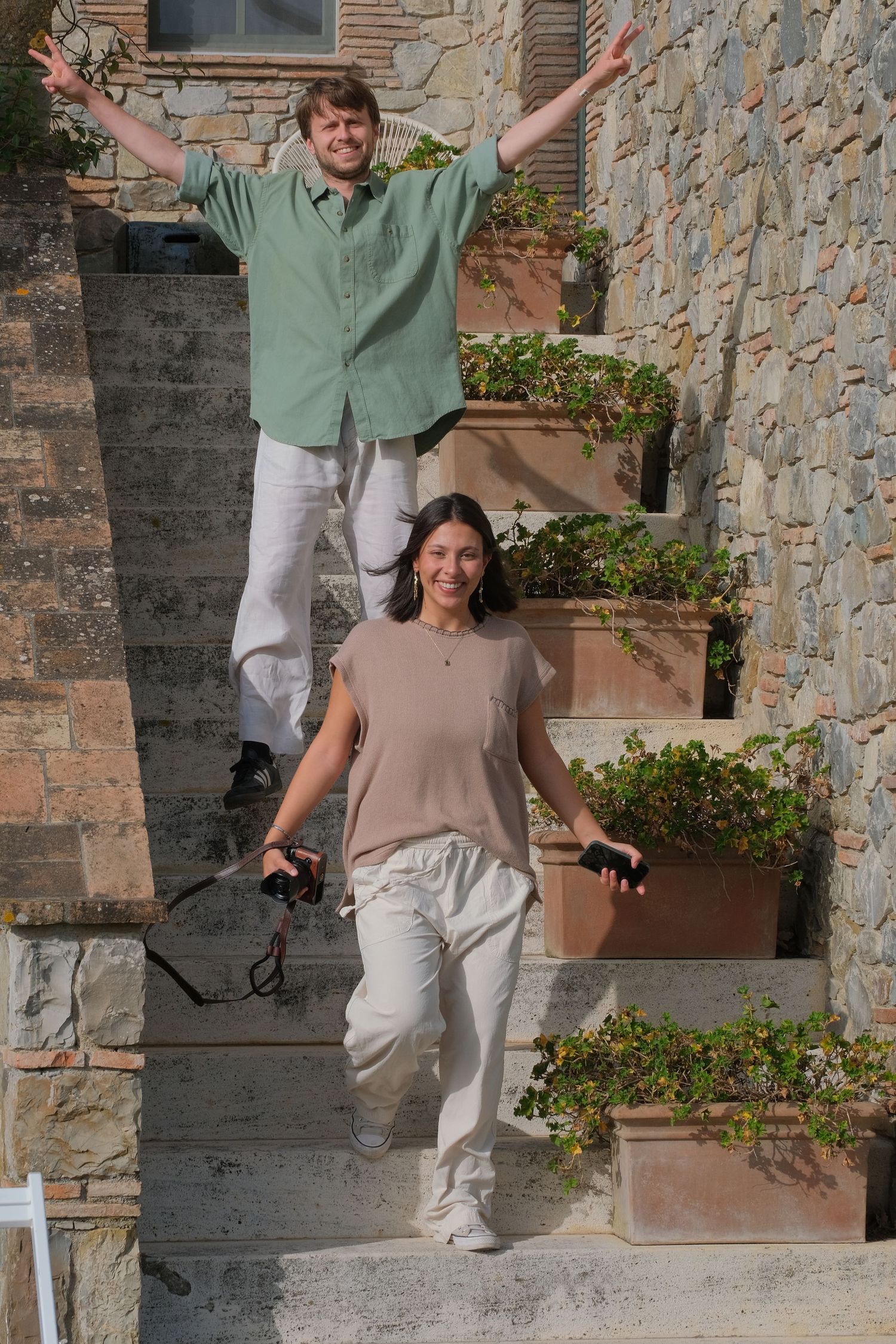 “Fun and relaxed family portrait in Italy with kids and parents enjoying authentic moments in Umbria and Tuscany.”