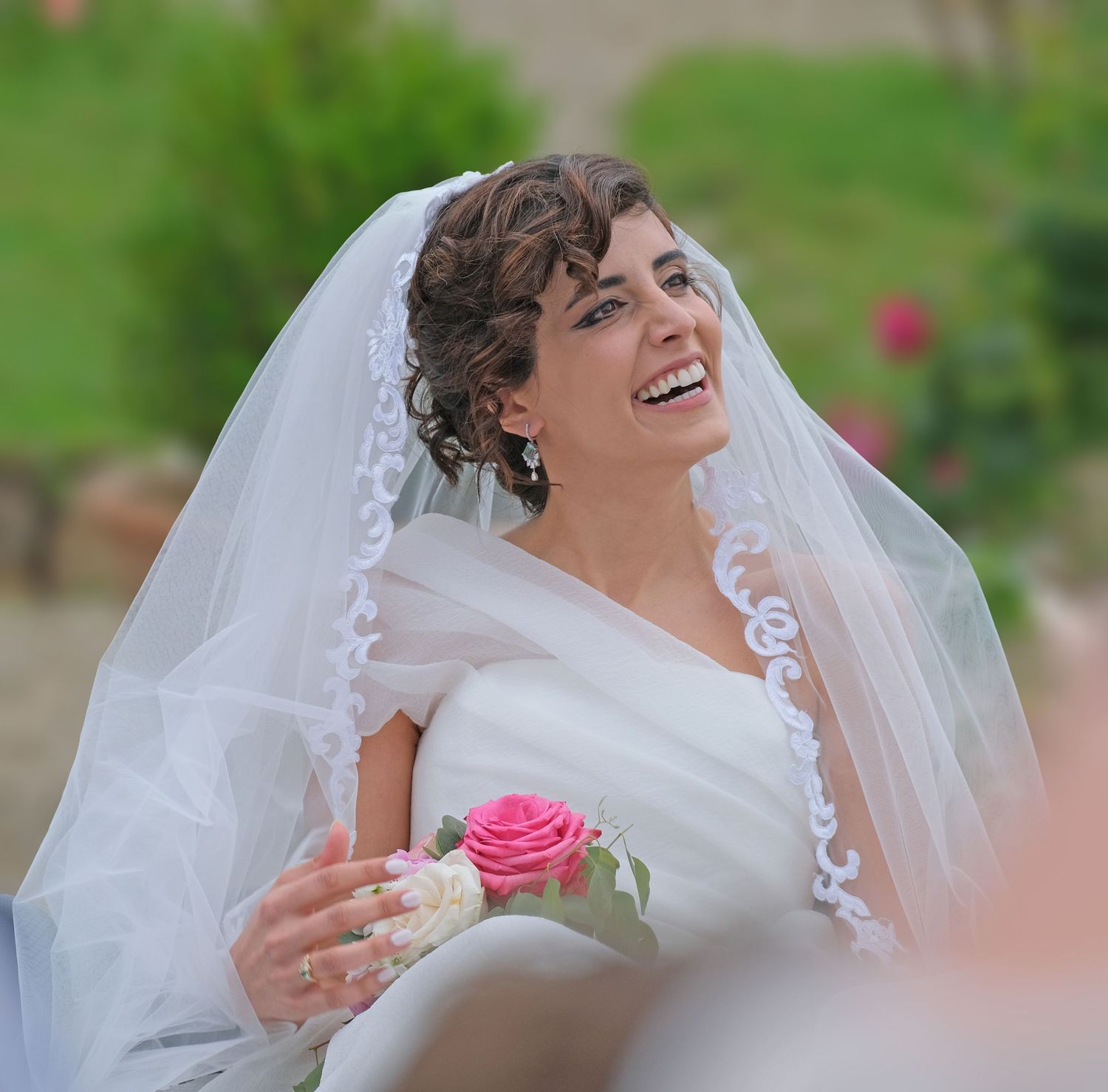 “Fun and joyful wedding photo in Italy capturing natural, playful, and loving moments of the bride and groom.”
