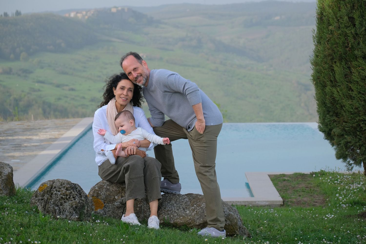 “Joyful family lifestyle photo in Italy capturing playful, natural moments with children and parents in Umbria and Tuscany.”