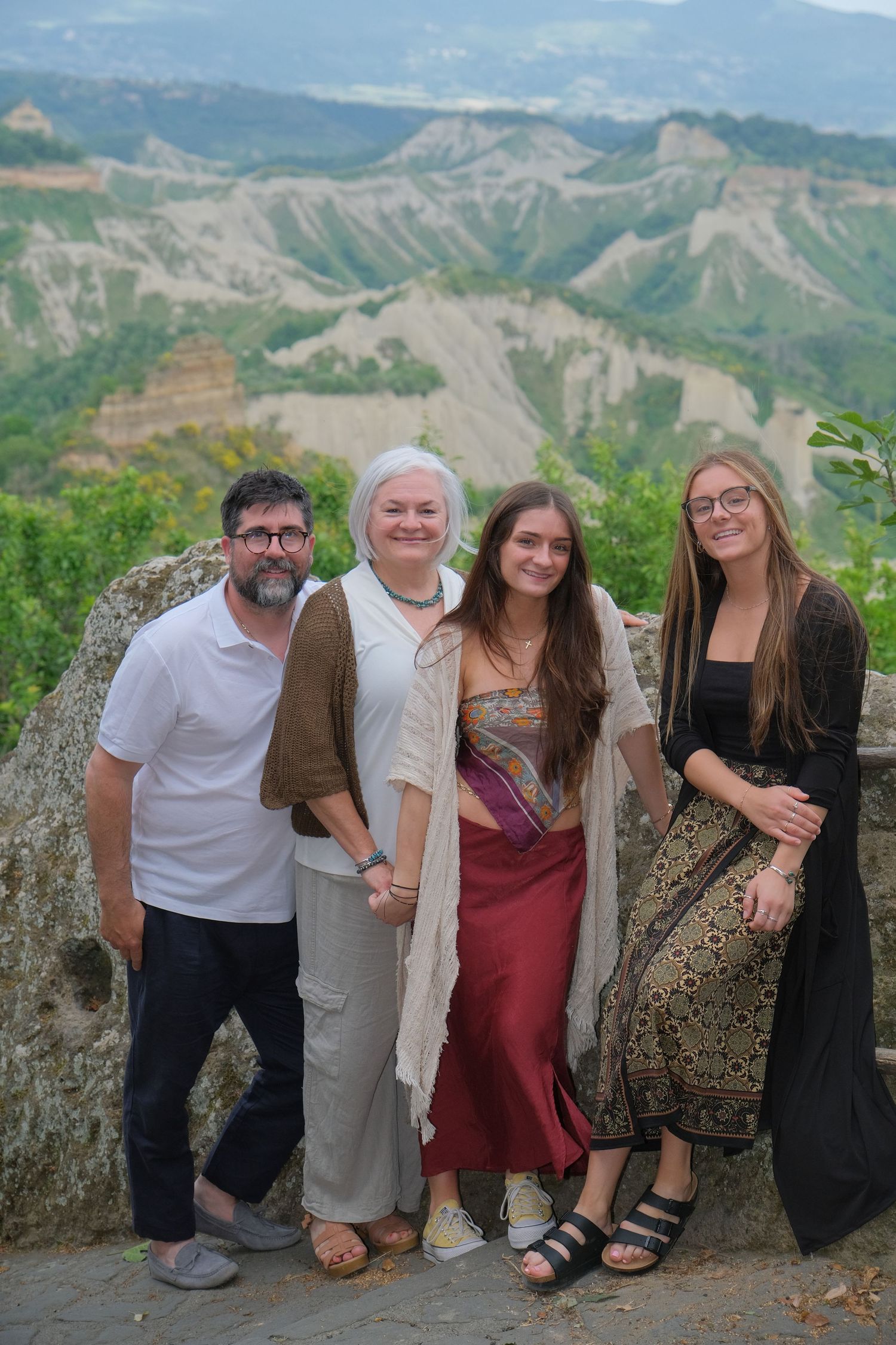 “Joyful family lifestyle photo in Italy capturing playful, natural moments with children and parents in Umbria and Tuscany.”