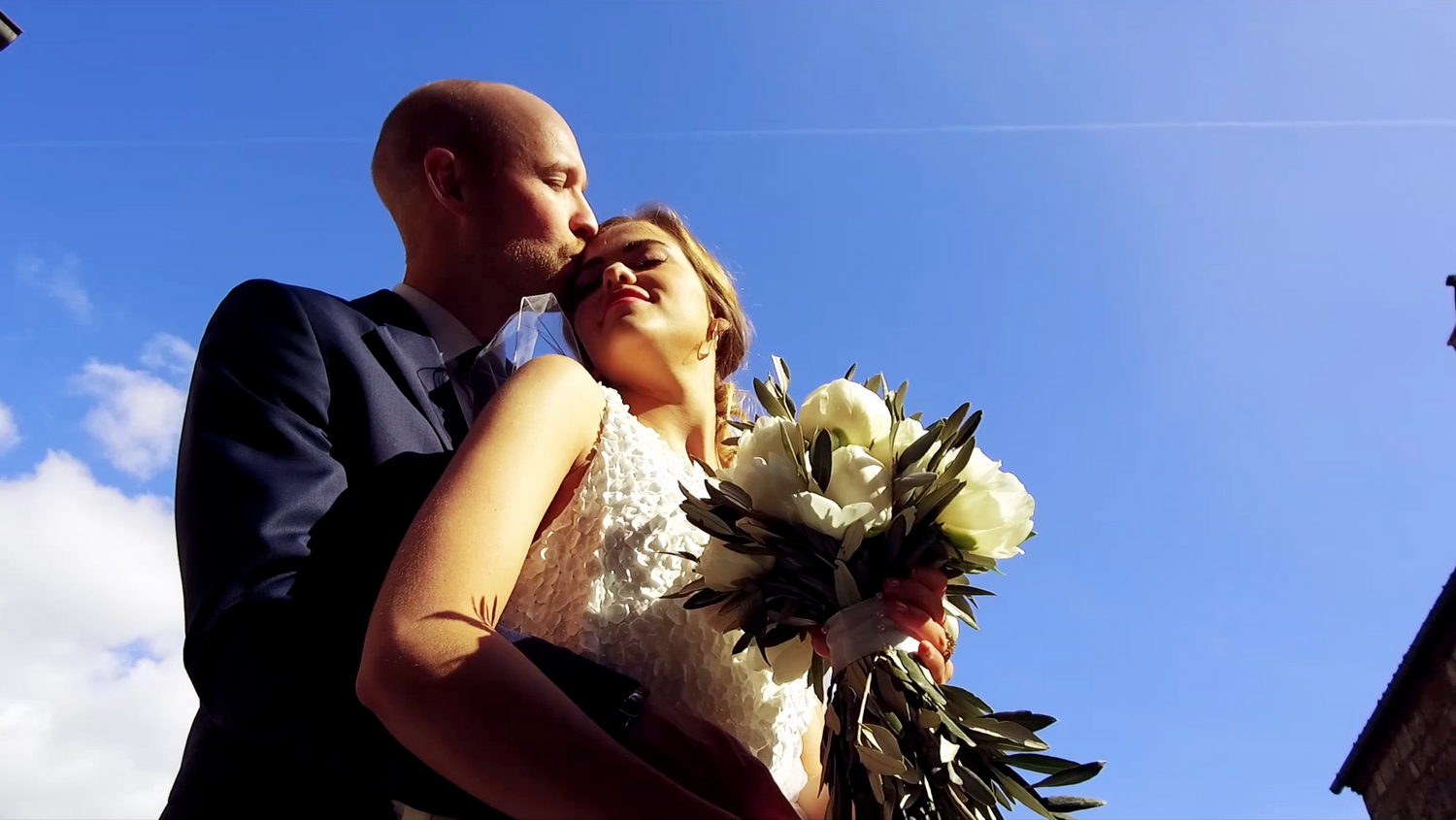 “Fun and joyful wedding photo in Italy capturing natural, playful, and loving moments of the bride and groom.”